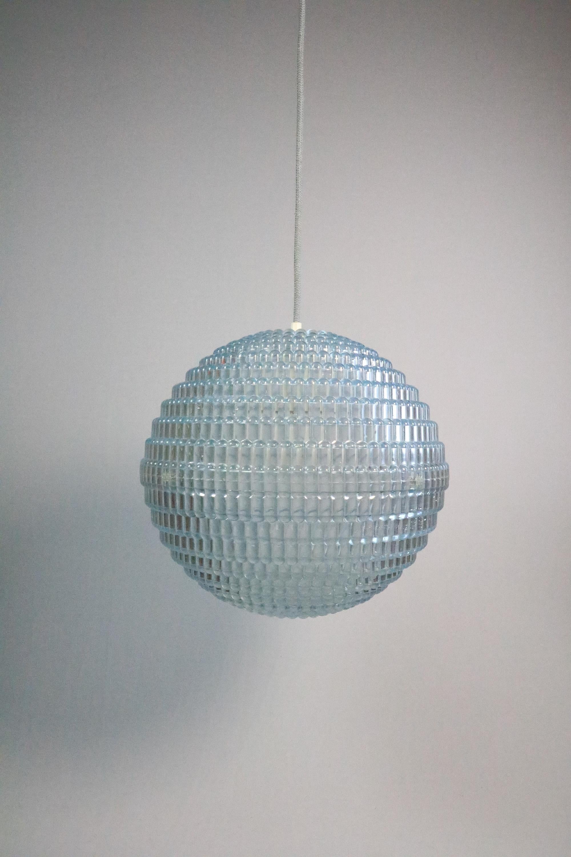 Rare large ball lamp with eye-catching relief in bubble design.
 
Great ice blue.
Newly wired with matching color textile cable.
 
In very good condition.
 
Diameter: 35 cm / 13.78 inches
Height on request.
1 x E27 socket (usable for E26 in