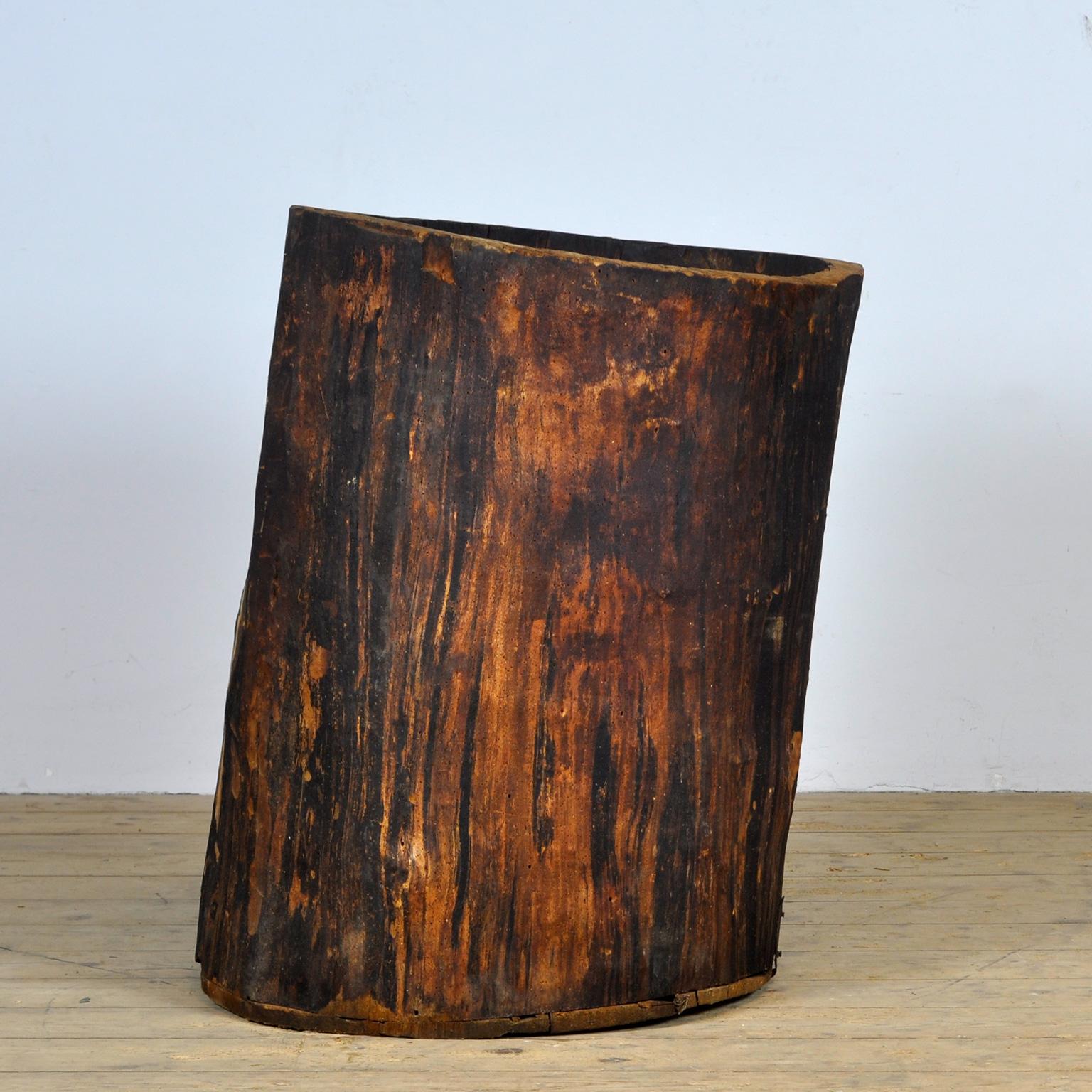 Hollowed out tree trunk used for storing grain etc. Hollowed out by hand. Beautiful object to use as a large planter. The item is made of hardwood and weighs approximately 50kg. Circa 1900.