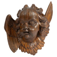 Grande testa d'angelo o cherubino in legno di quercia intagliato a mano del XIX secolo