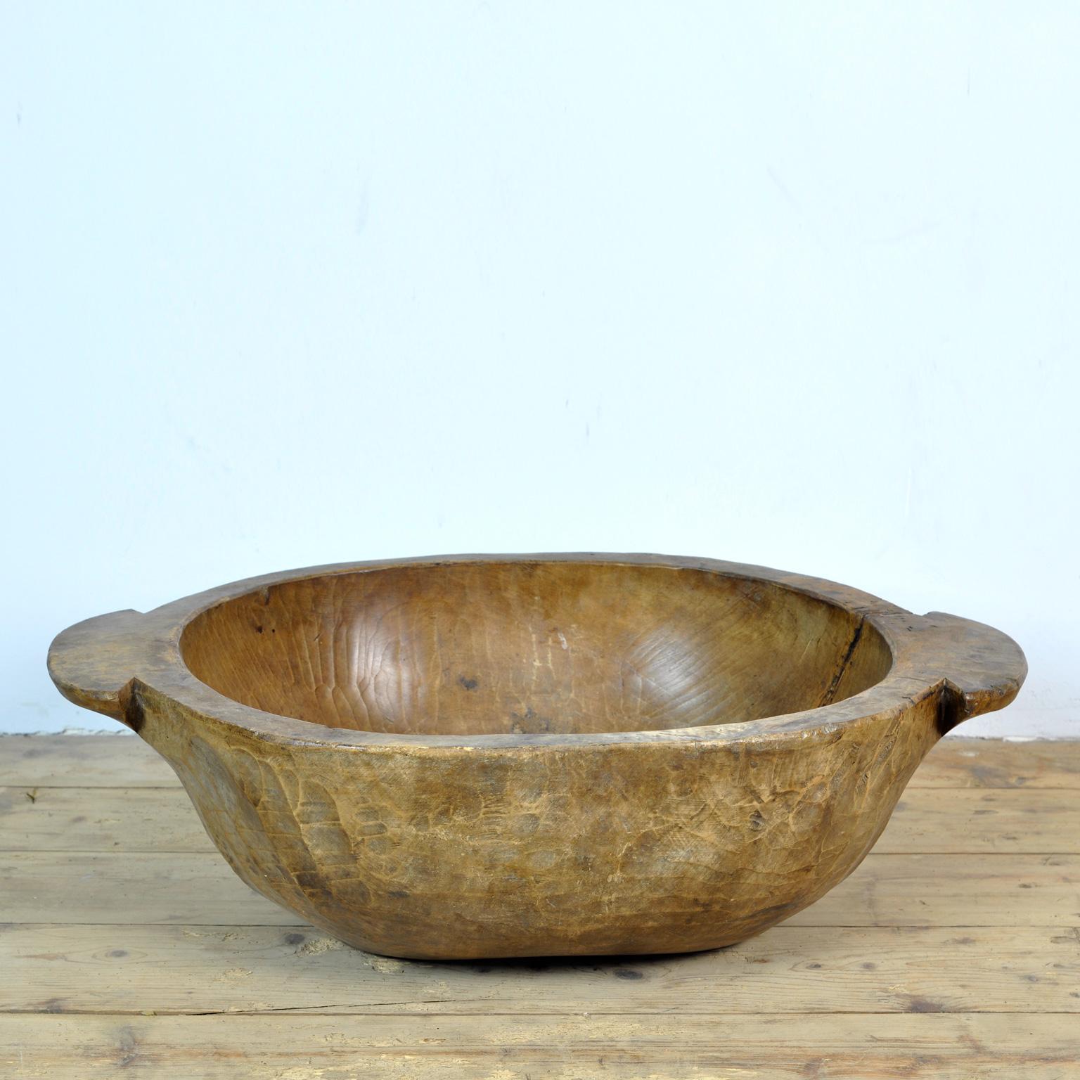 Beautiful hand carved Hungarian dough bowl, 1900s. Made of fruitwood.
In good condition.