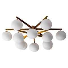 Big Italian elegant and decorative Chandelier in Brass and glass, Angelo Lelii