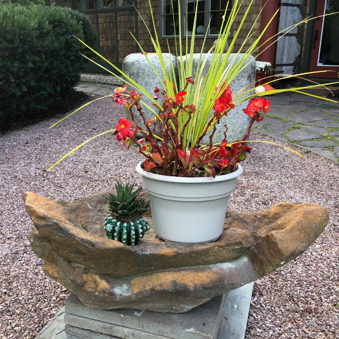 Japan, a stunning and unique large antique naturally formed solid shikoko stone water basin, tsukubai- sourced from a decades old garden, with original natural colors and nature created in a handsome sandstone natural color.

One of a kind and