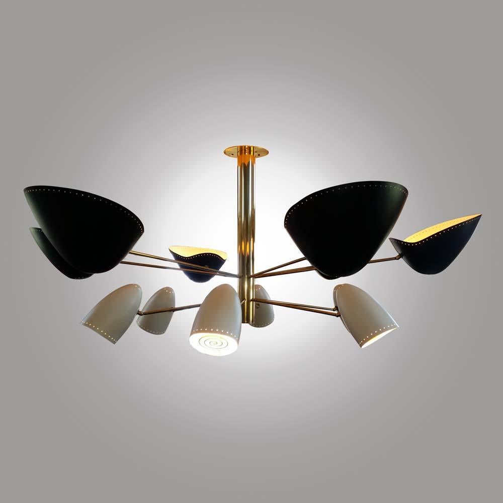 Big lamp chandelier, an elegant 12 lighting fixture, brass structure and arms with black and white enamelled articulating metal shades, made with high artisanal skill inspired by midcentury design. Italian design by Artist Diego Mardegan. Made in