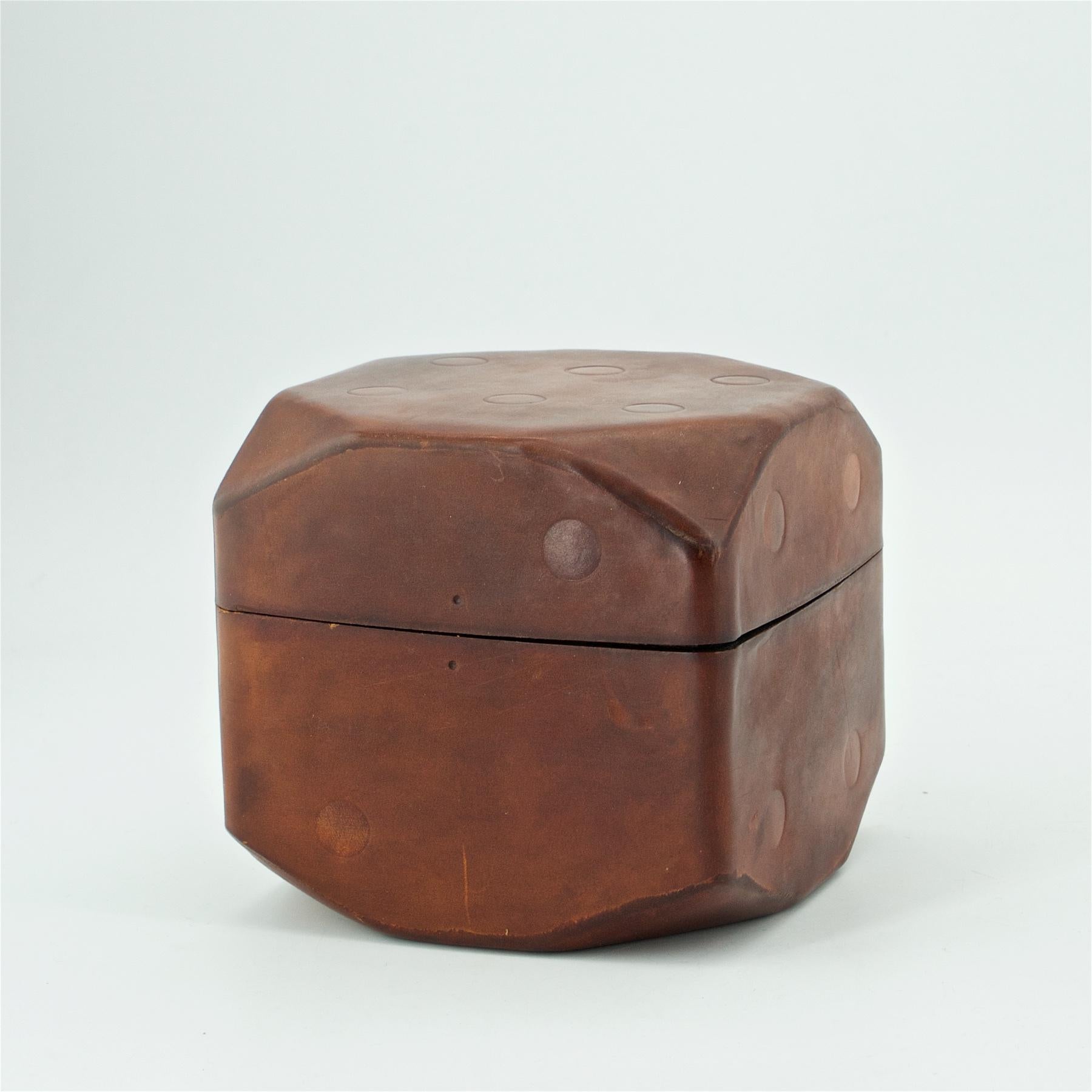 Nice leather covered box in form of a die.