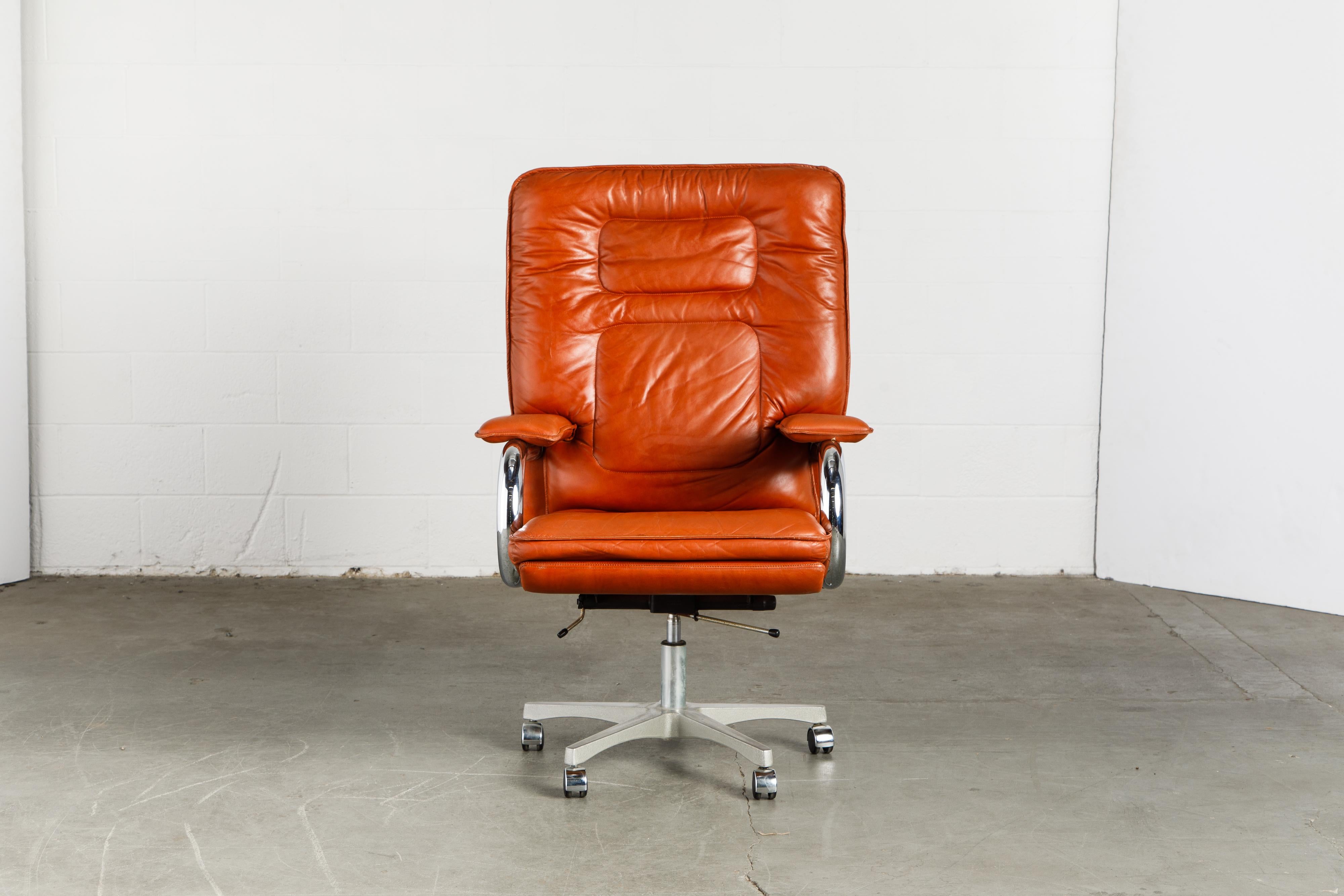This incredible executives chair is named 'Big', designed by Guido Faleschini by i4 Mariani for The Pace Collection. This 1970s / 1980s large scale high back executive swivel desk chair retains its original high-quality and supple cognac / caramel