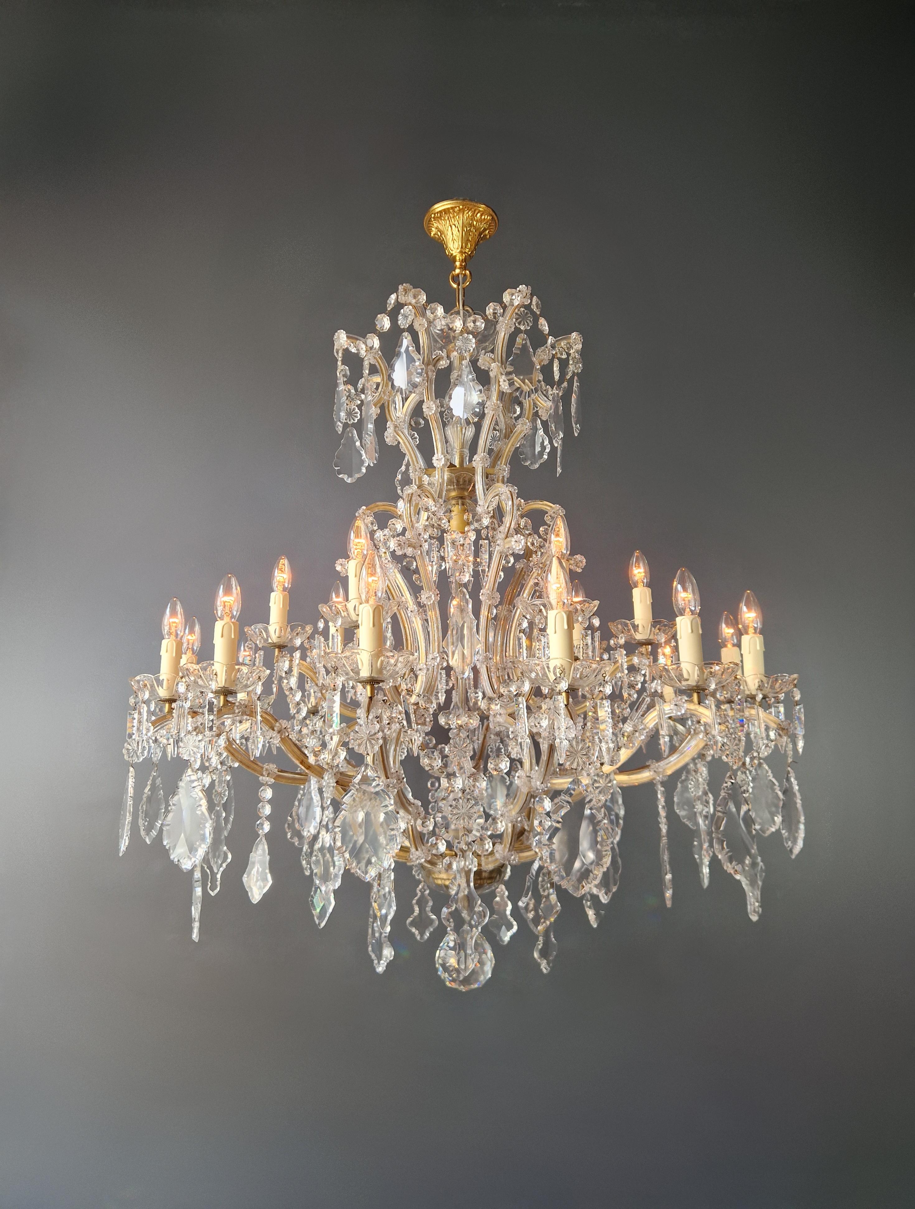Old chandelier with love and professionally restored in Berlin. electrical wiring works in the US. Re-wired and ready to hang. not one missing. Cabling completely renewed. Crystal, hand-knotted.

The frame is fully dressed all-over with glass. Cut