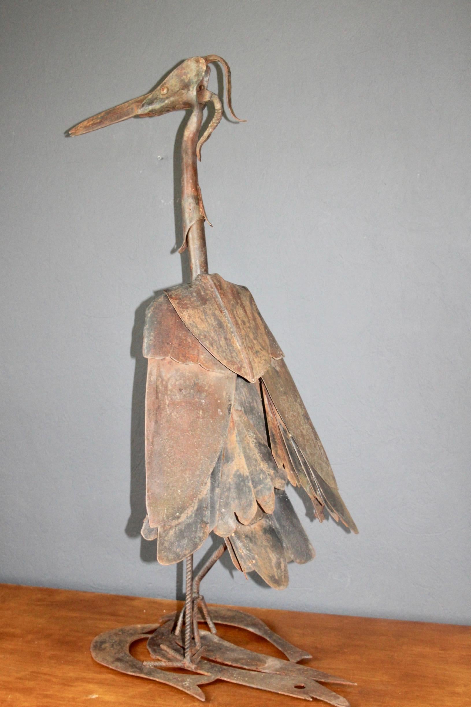 Big metal bird sculpture.
