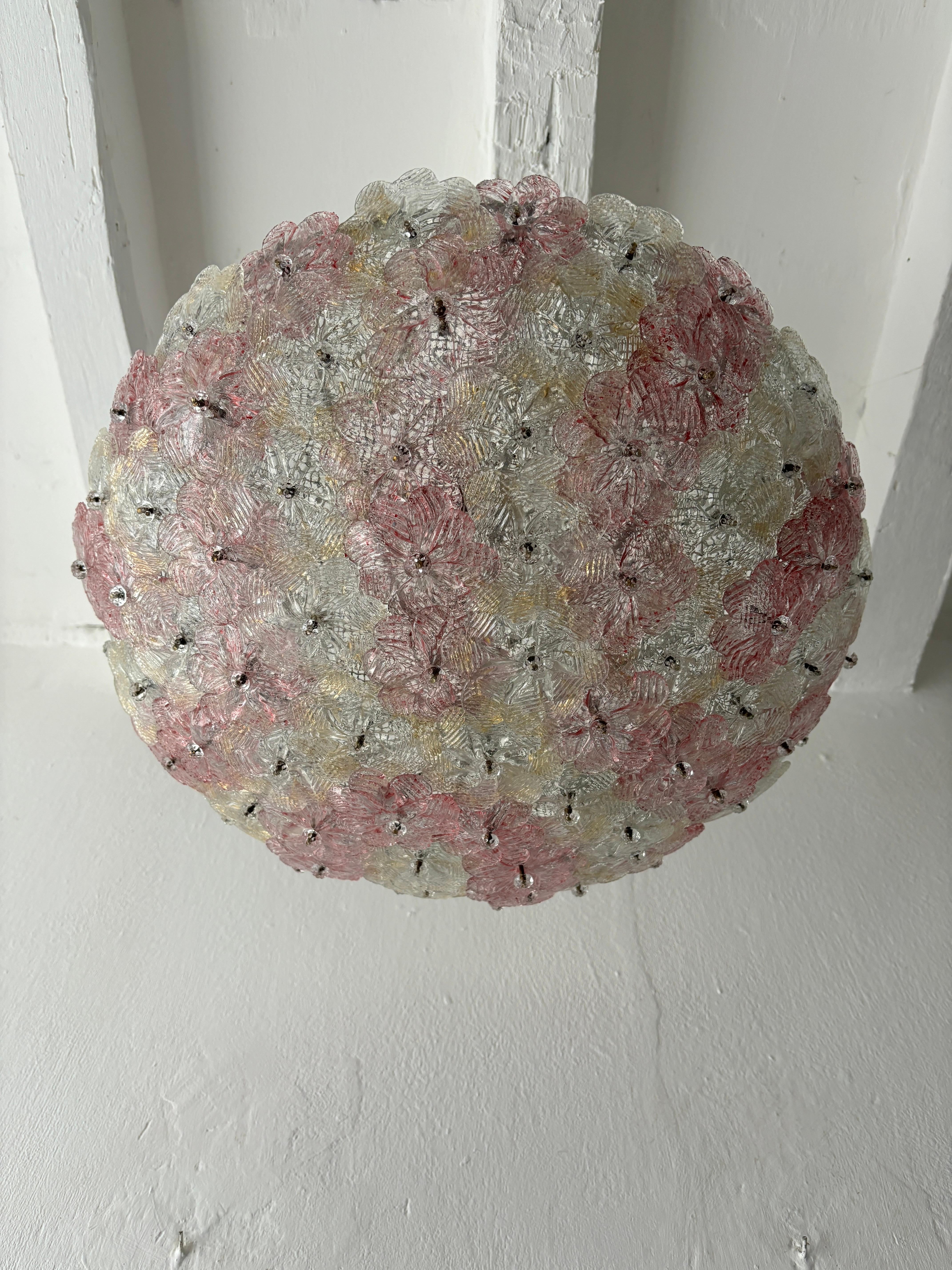 Housing 3 lights. Will be newly rewired free of charge with certified UL US sockets for the USA and appropriate sockets for all other countries and ready to hang. Wonderful pink and clear with gold Murano flowers.  Big size.   Rare to find with