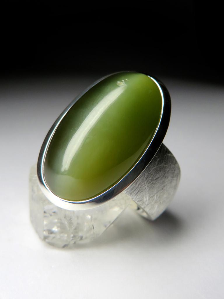Big scratched silver ring with natural cat's eye Nephrite
stone weight - 17.5 carats
stone measurements - 0.28 х 0.51 х 0.93 in / 7 х 13 х 23 mm
ring size - 7.25 US 
ring weight - 17.39 grams