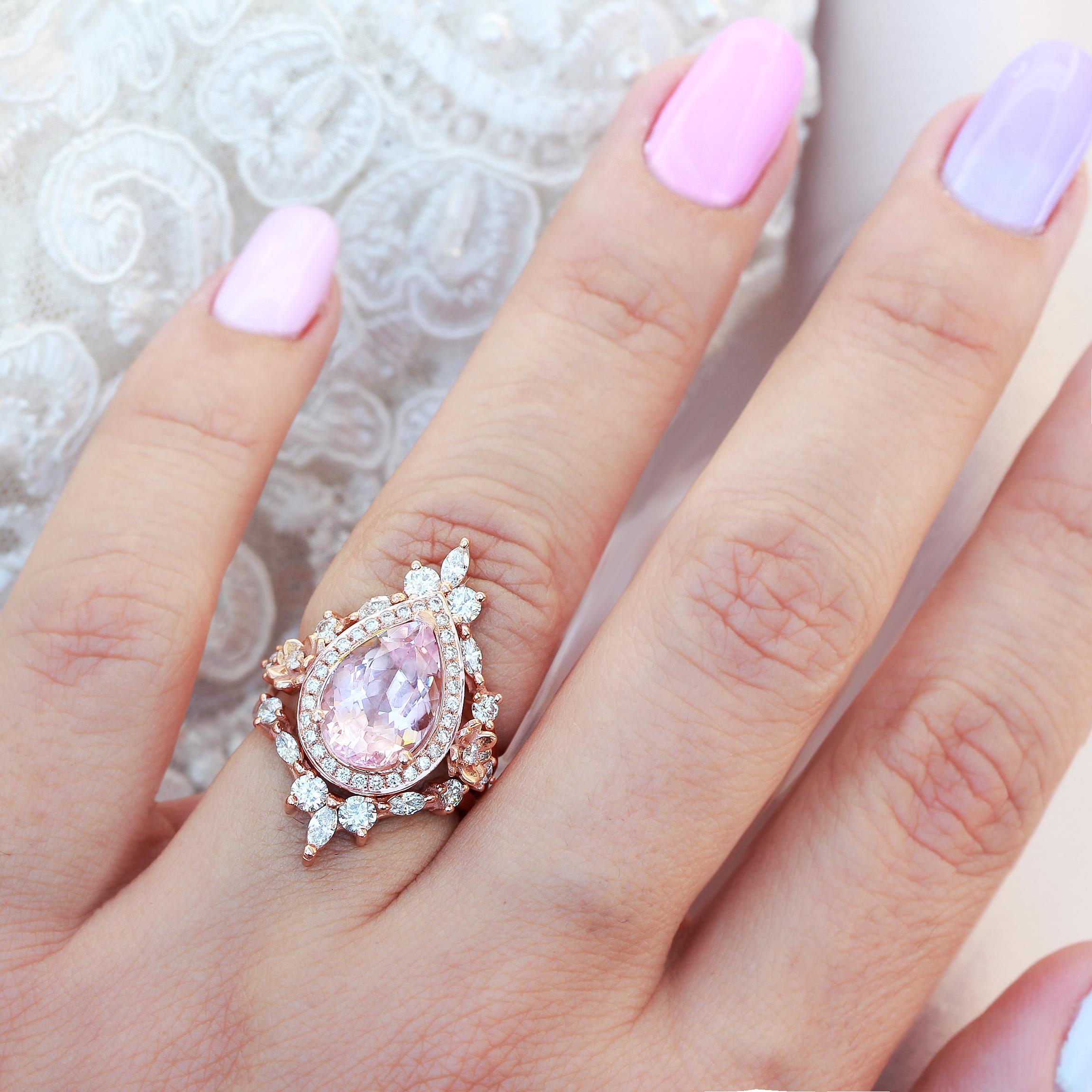 Excellent pear-shaped morganite engagement three rings set with diamond wedding bands - Antheia.
Antheia was the goddess of flowers and flowery wreaths.
Handmade with care. 
An original design by Silly Shiny Diamonds. 

Details: 
* Center Stone