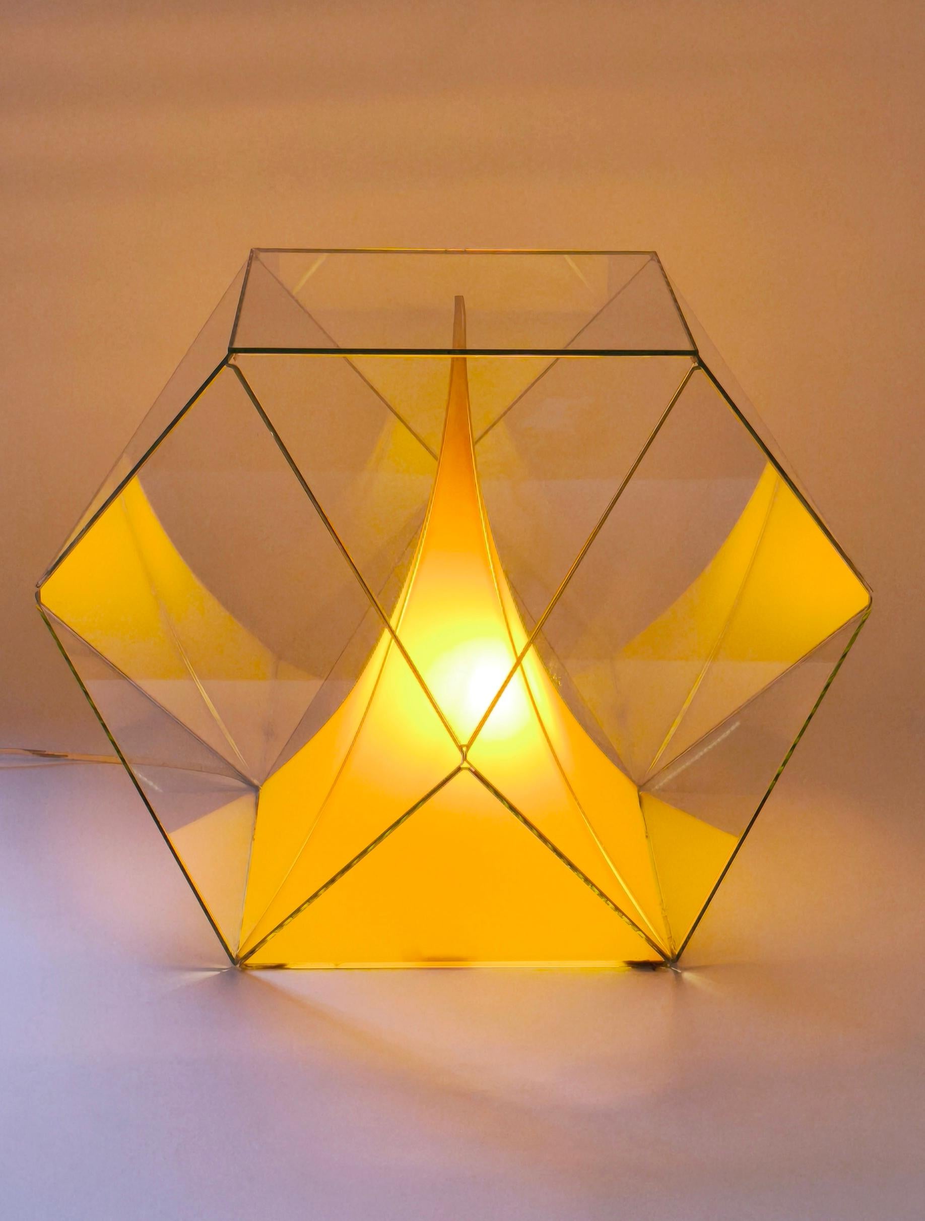 Big multi-sided plexiglass sculpture lamp - 1970s - France
.
Never seen before.
.
The lamp is made up of 14 different plexiglass faces and in its center the pyramidal shape seems to be made of polymer/plastic and gives it an absolutely unique