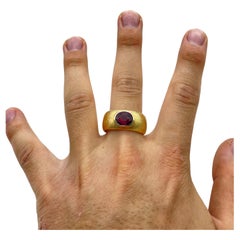 Big powerful men ring with rhodolith