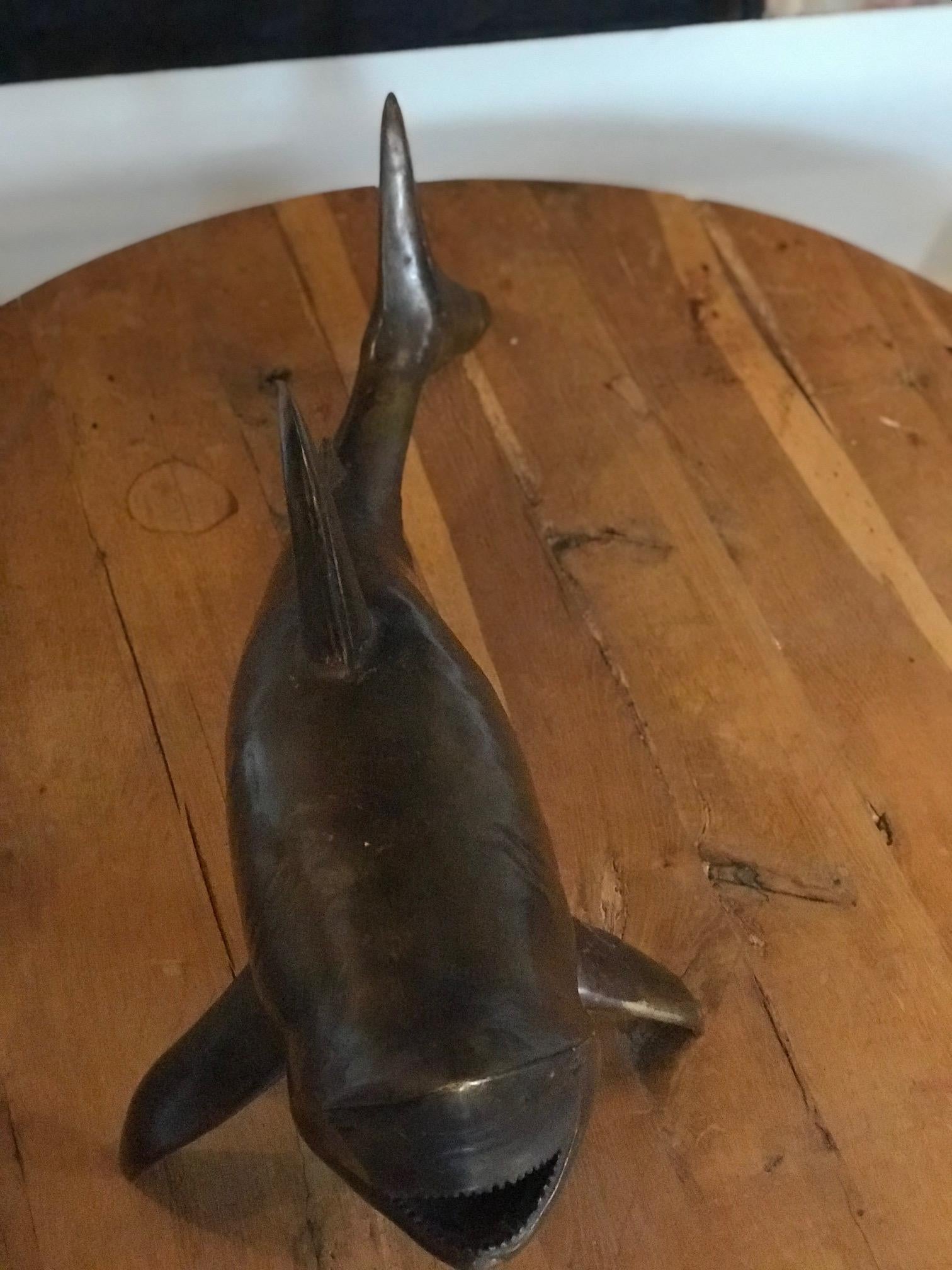 hammerhead shark sculpture made of hammers