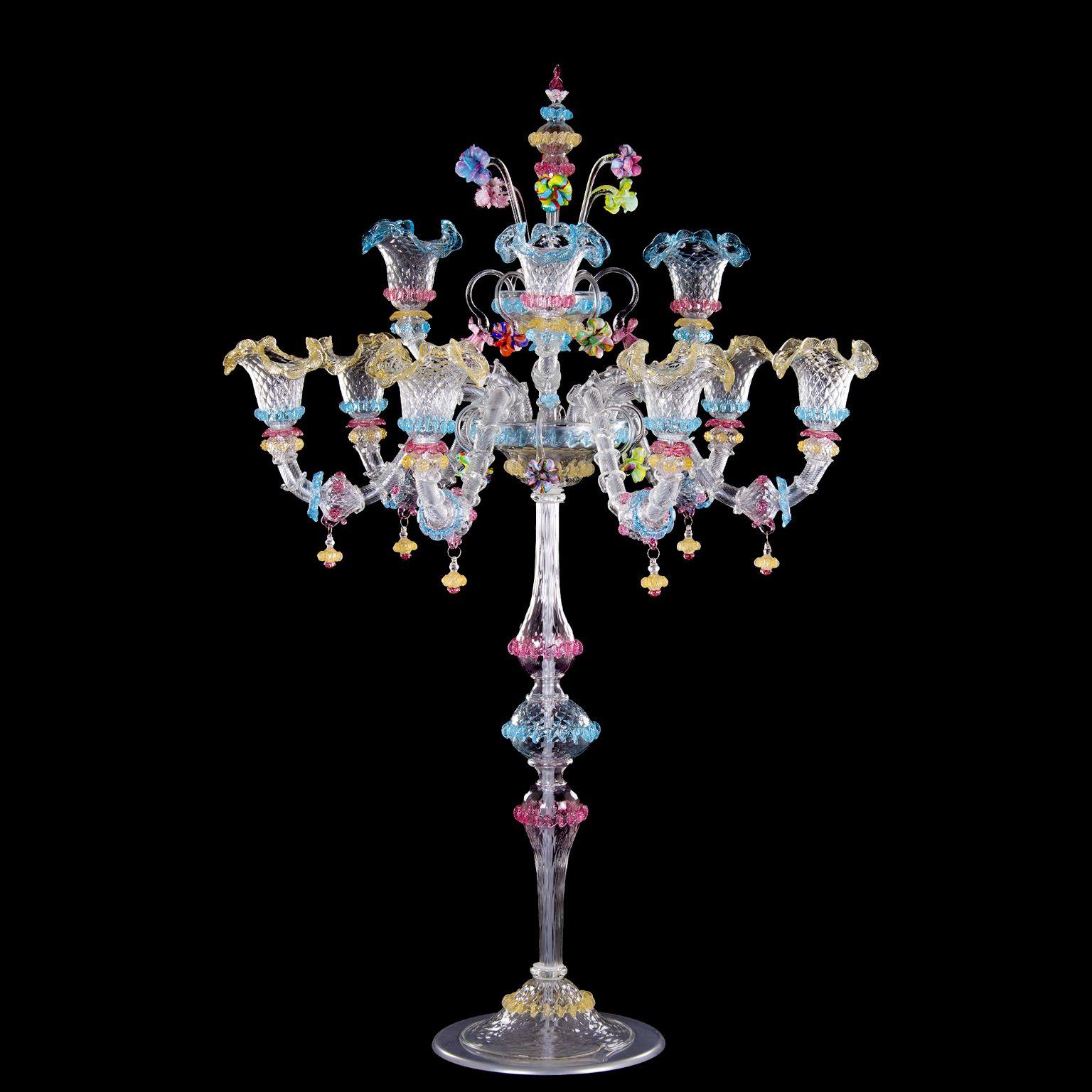 Big luxury rezzonico flambeau 6+3 arms, crystal Murano glass, rich of multi-color details nickel structure by Multiforme.
This artistic table lamp is an elegant and delicate lighting work, colored with pastel tones. The structure is a combination of