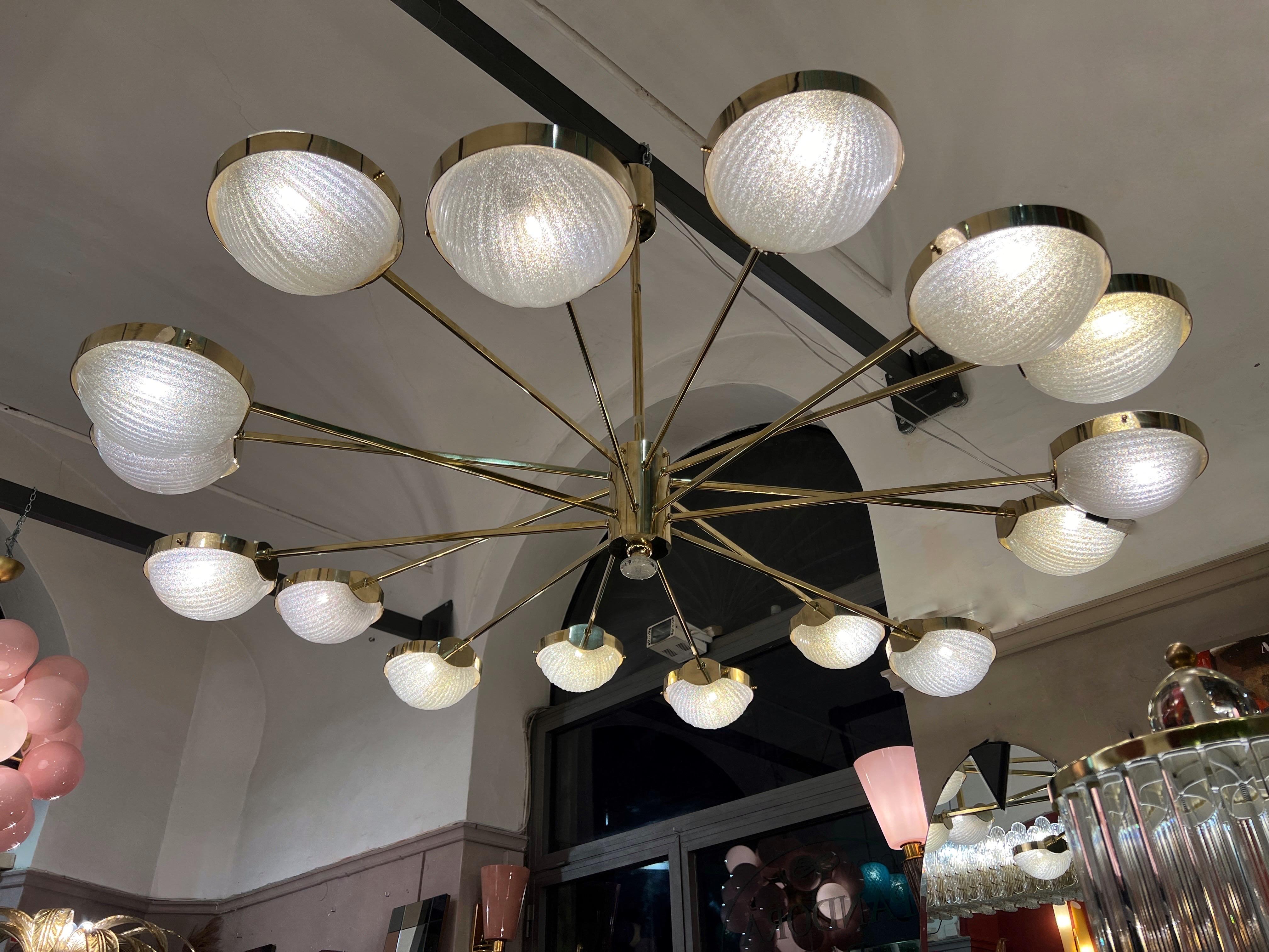 Italian Big Round Murano Clear Glass and Staggered Brass Arms Chandelier 1970 For Sale