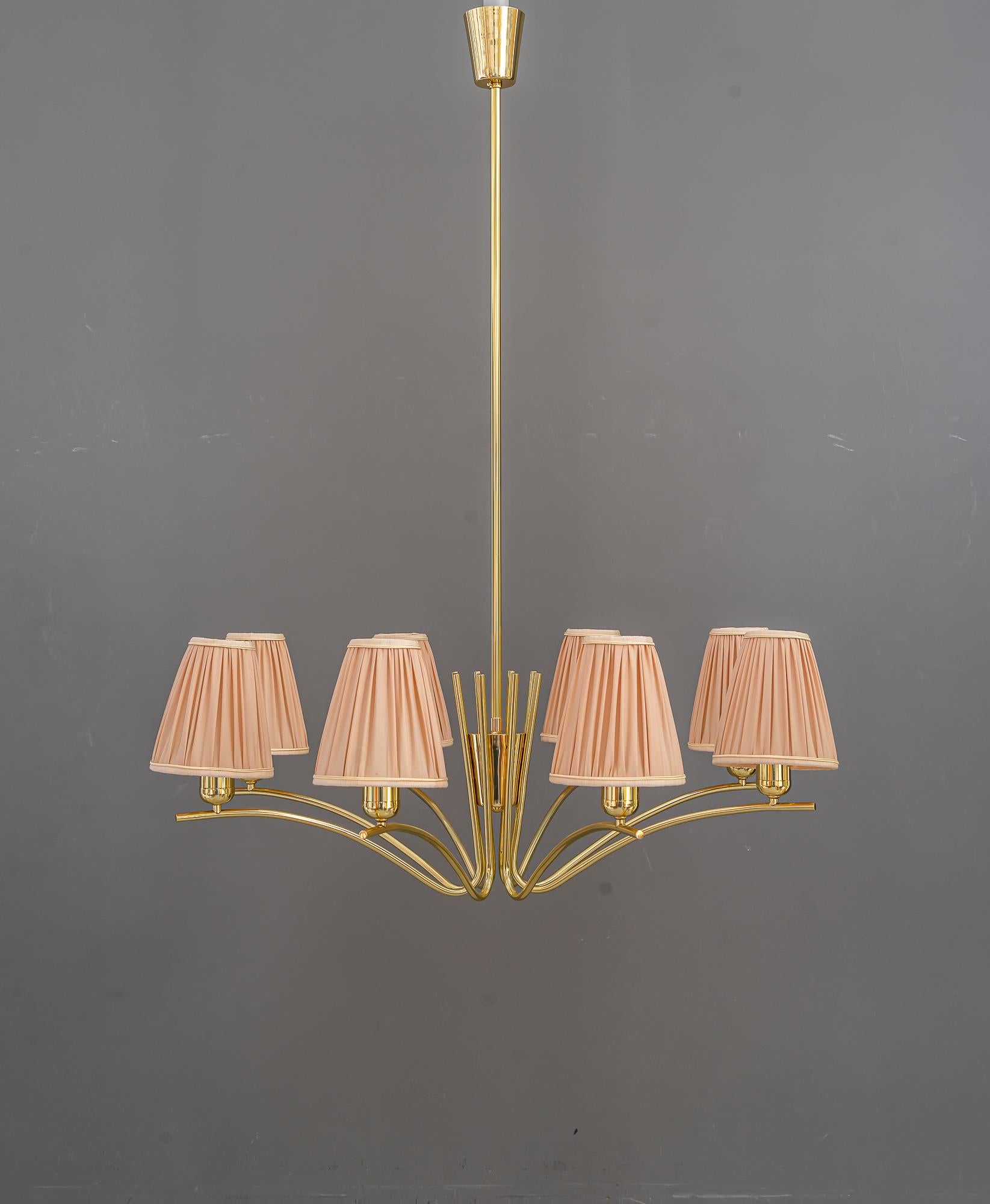 Big Rupert Nikoll chandelier with fabric shades vienna arond 1960s 
Brass polished and stove enameled
The fabric shades are replaced ( new ).