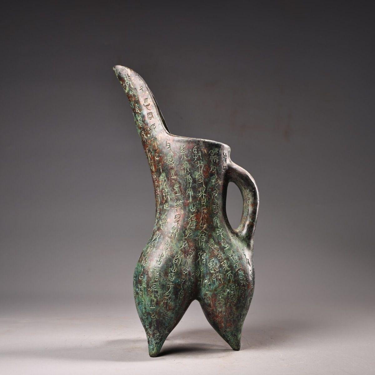 A Big Size Vintage Bronze Wine Cup Covered with Full Ancient Characters is a fascinating and historically significant artifact, often evoking the grandeur and cultural depth of ancient China. These types of vessels were commonly used in rituals,