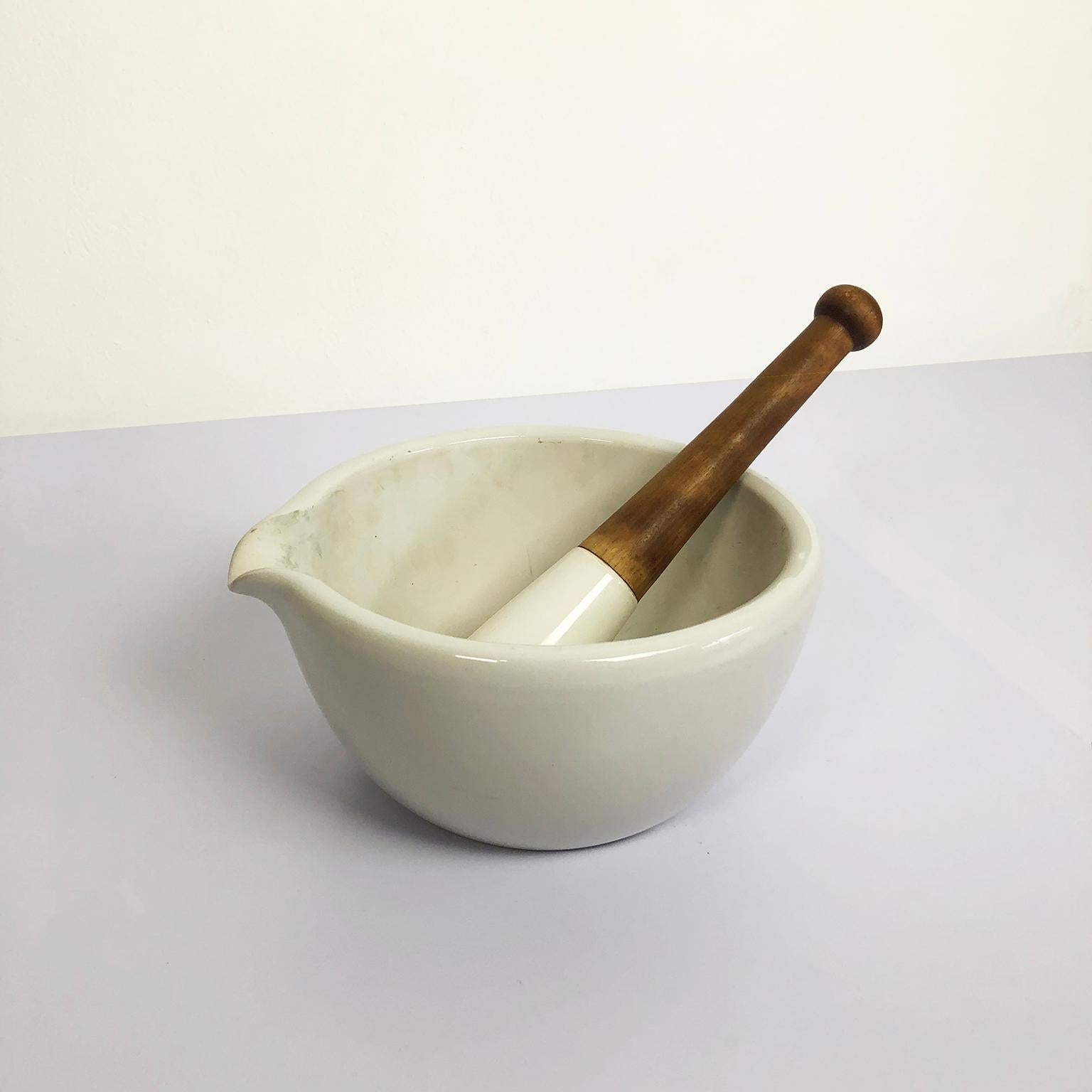 Porcelain mortar and pestle. Great for cooks or as an accent piece. Heavy duty. Mortar weighs over 25 lbs. Includes pestle.