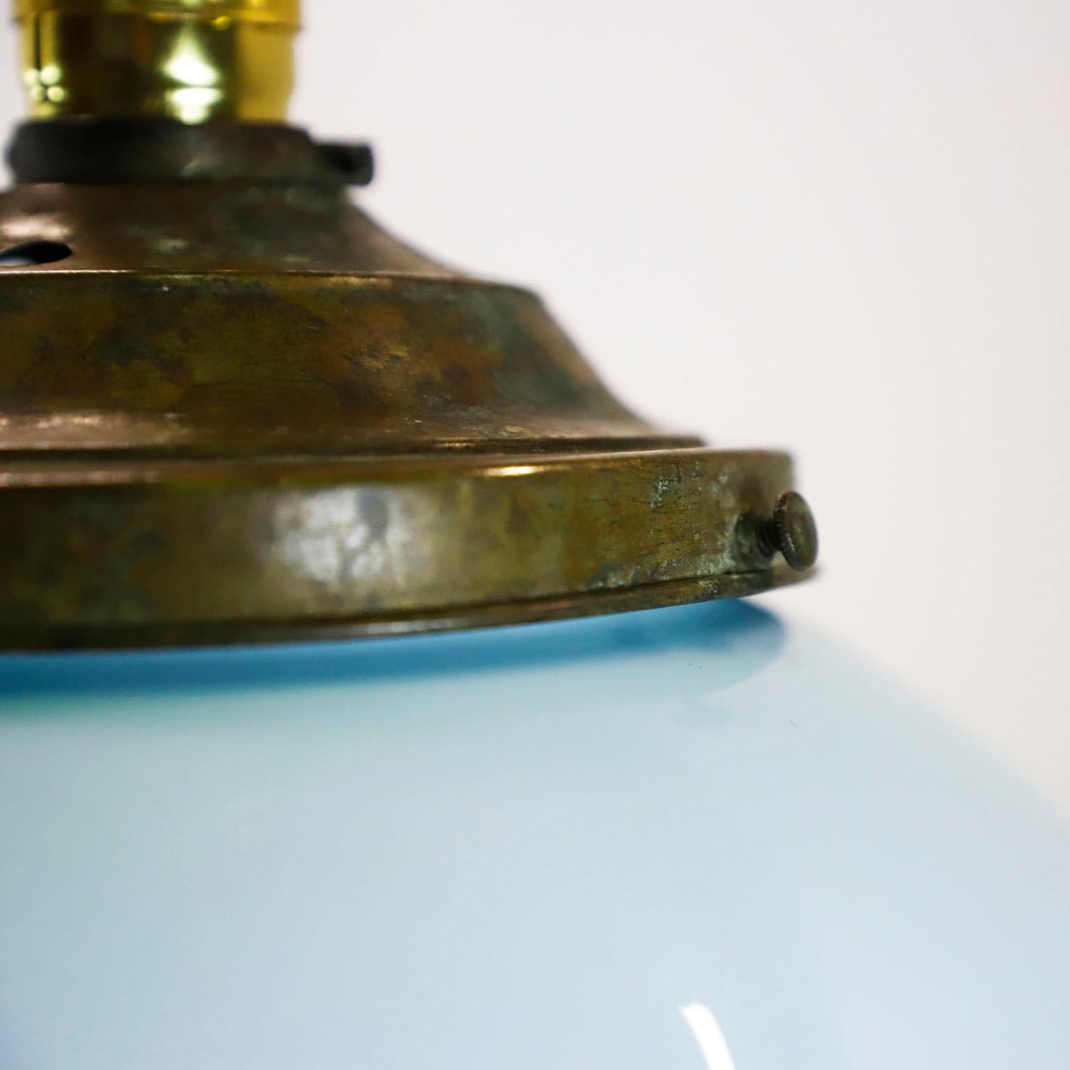 Circa 1930. We offer this Art Deco Big Size pendant light made in milk glass circular shade rare blue color. Great patina and excellent vintage conditions. 
All wiring and sockets are new