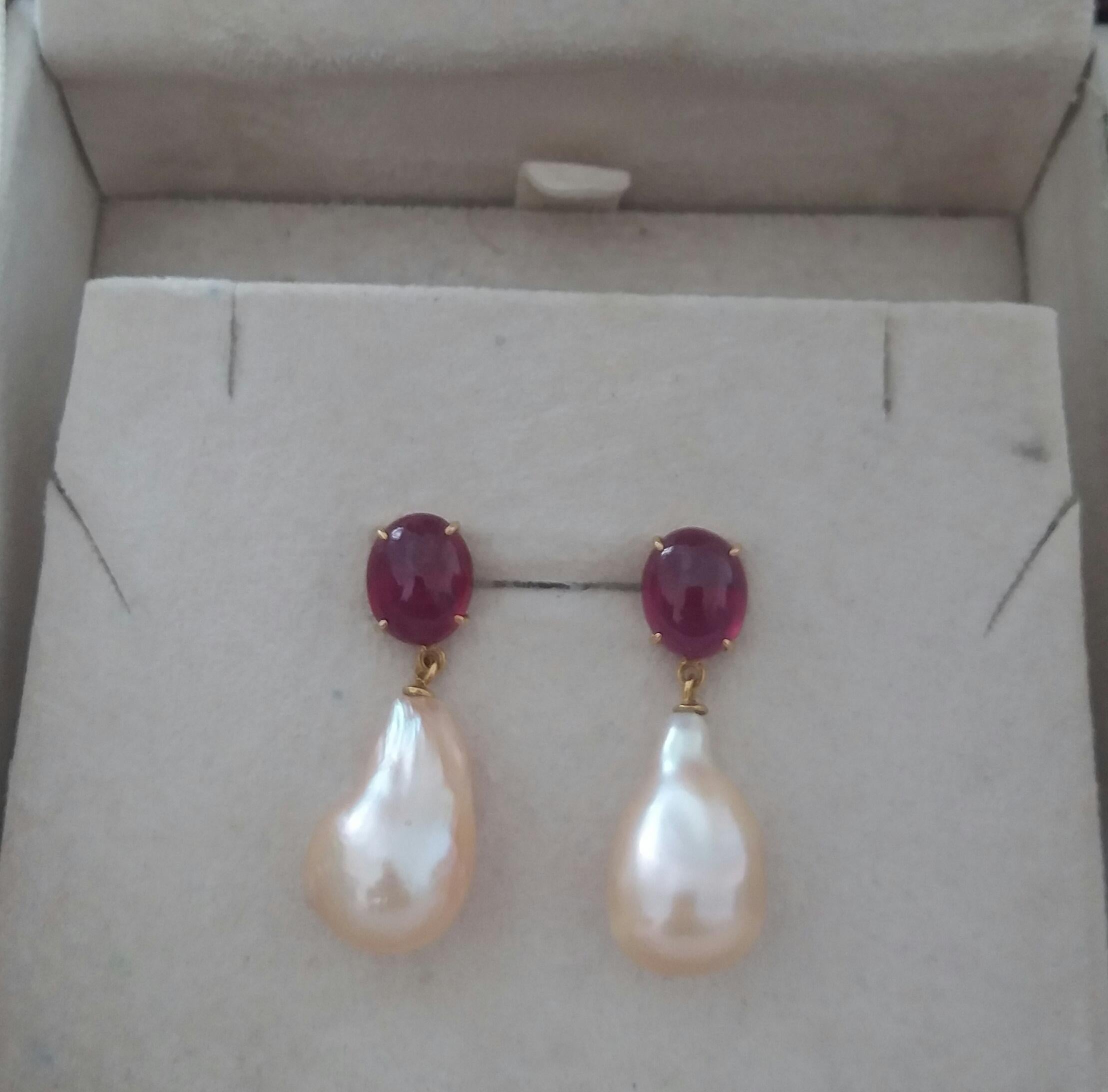 Contemporary Big Size Pear Shape Cream Color Pearls Oval Ruby Cabochon 14 Karat Gold Earrings For Sale