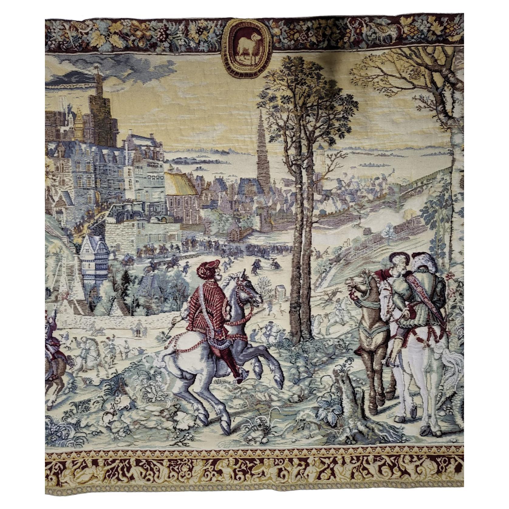 Very big dimension wool Tapestry representing the Royal Hunt of Maximilian. 
Made in a mecanic jacquard style. The original one is in the Louvre Museum in Paris.
In a very good condition, it has fixation rings all over its back part which makes