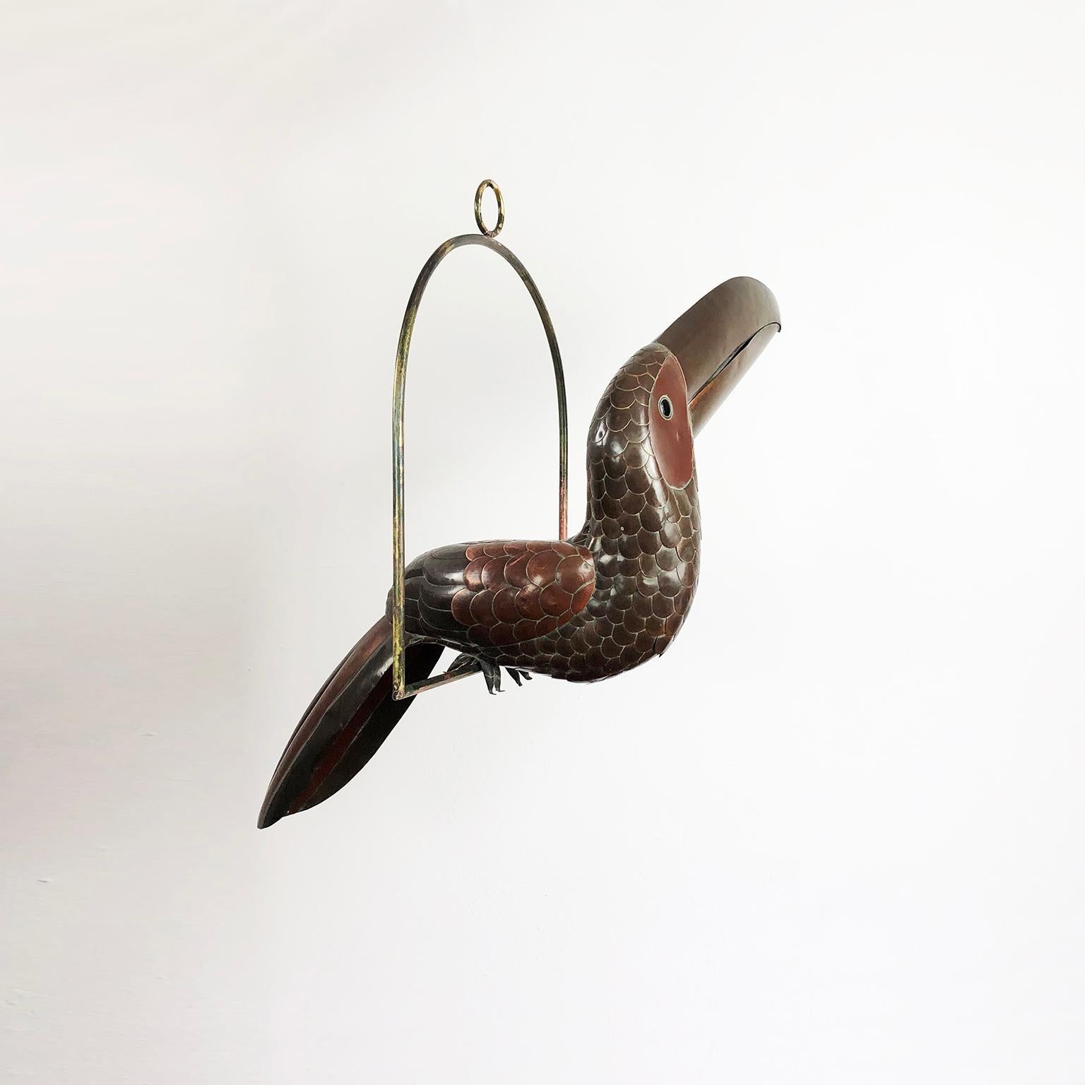 We offer this toucan sculpture by Mexican artist Sergio Bustamante, circa 1960 made in brass and copper with fantastic patina.