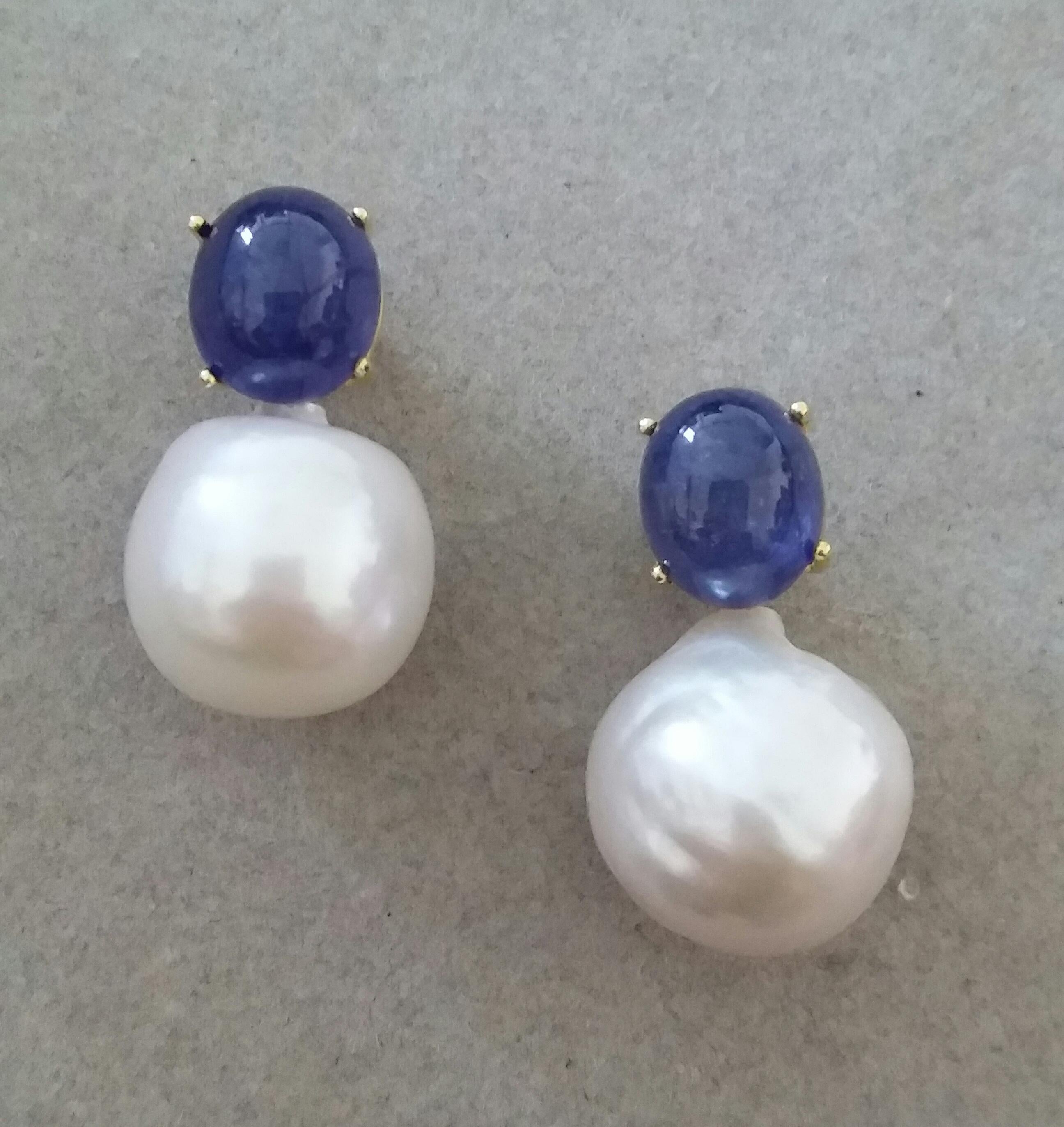 Art Deco Big Size White Baroque Pearls Oval Blue Sapphires Cabochons Yellow Gold Earrings For Sale