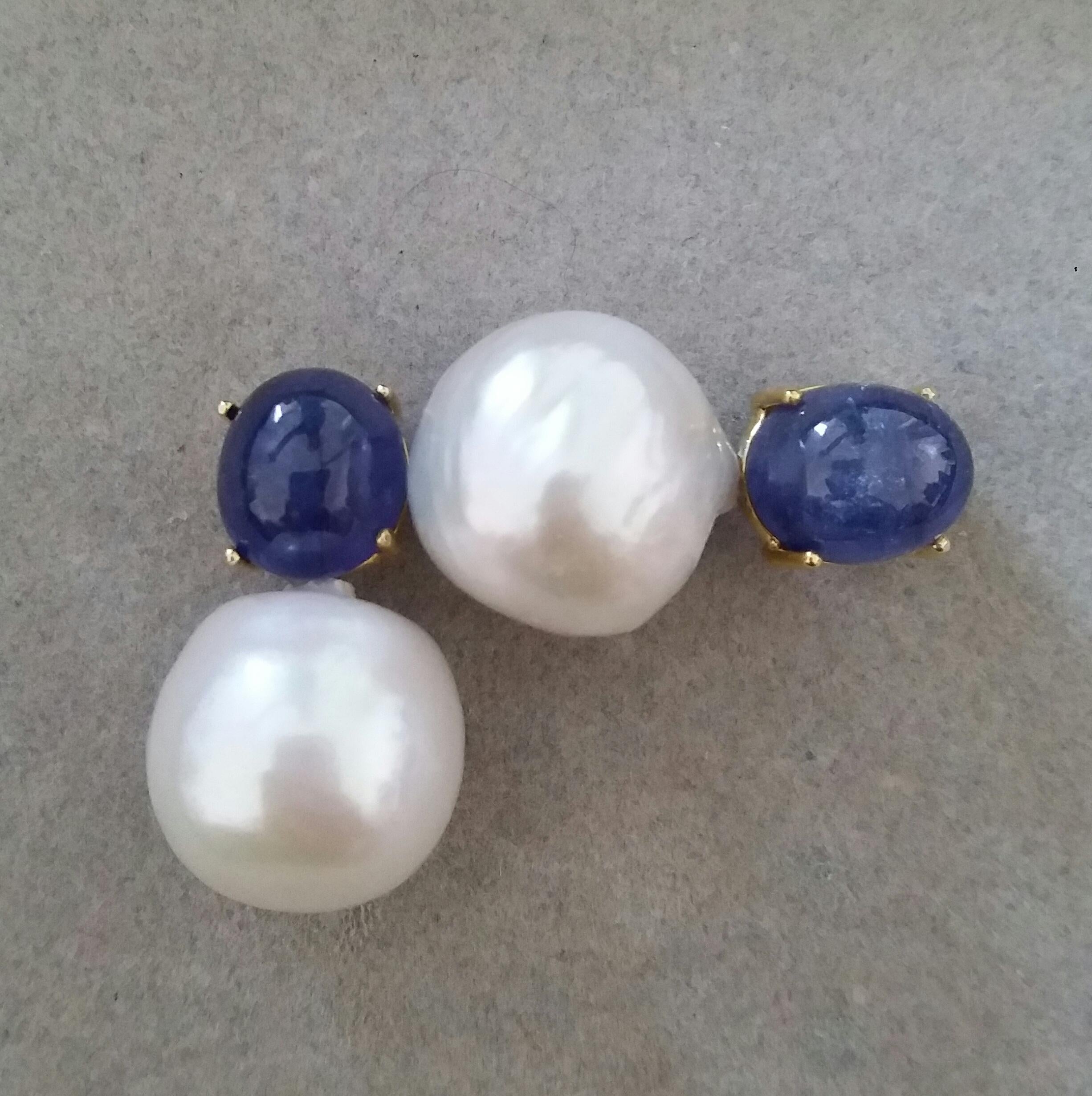 Art Deco Big Size White Baroque Pearls Oval Blue Sapphires Cabochons Yellow Gold Earrings For Sale