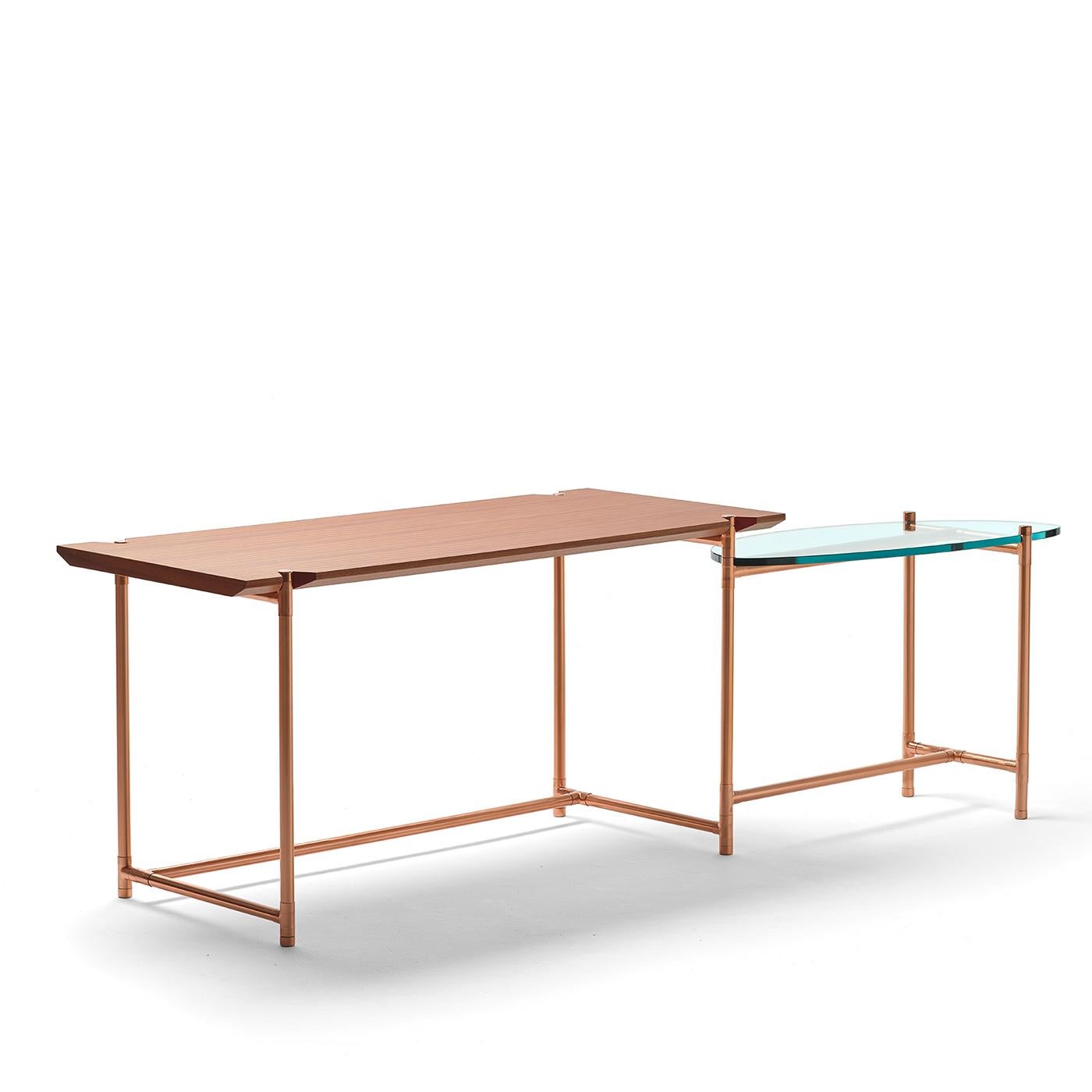 Blending lightweight and prized materials, this sleek desk will accent any modern office or study with subtle sophistication. The inner steel structure with external copper tubing supports a rectangular top in oak-veneered, medium-density fibreboard