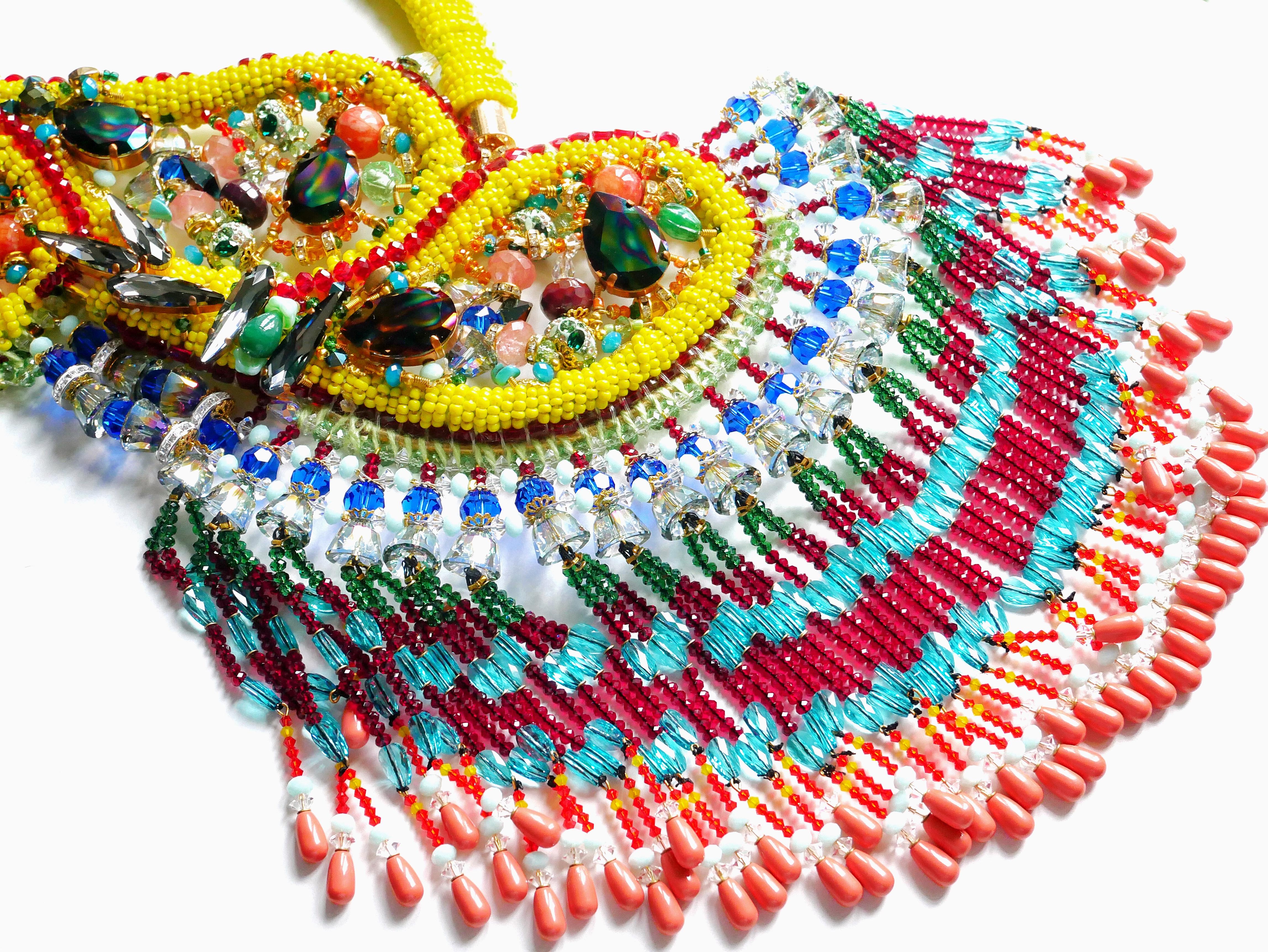 The Big Swarovski Crystal and Multi-Beaded Embellished Paisley Tassel Bib Necklace is a treasure and rare find. My intention for this design was to create a unique ageless wearable art that is extravagant, detailed, and has a fascinating story
