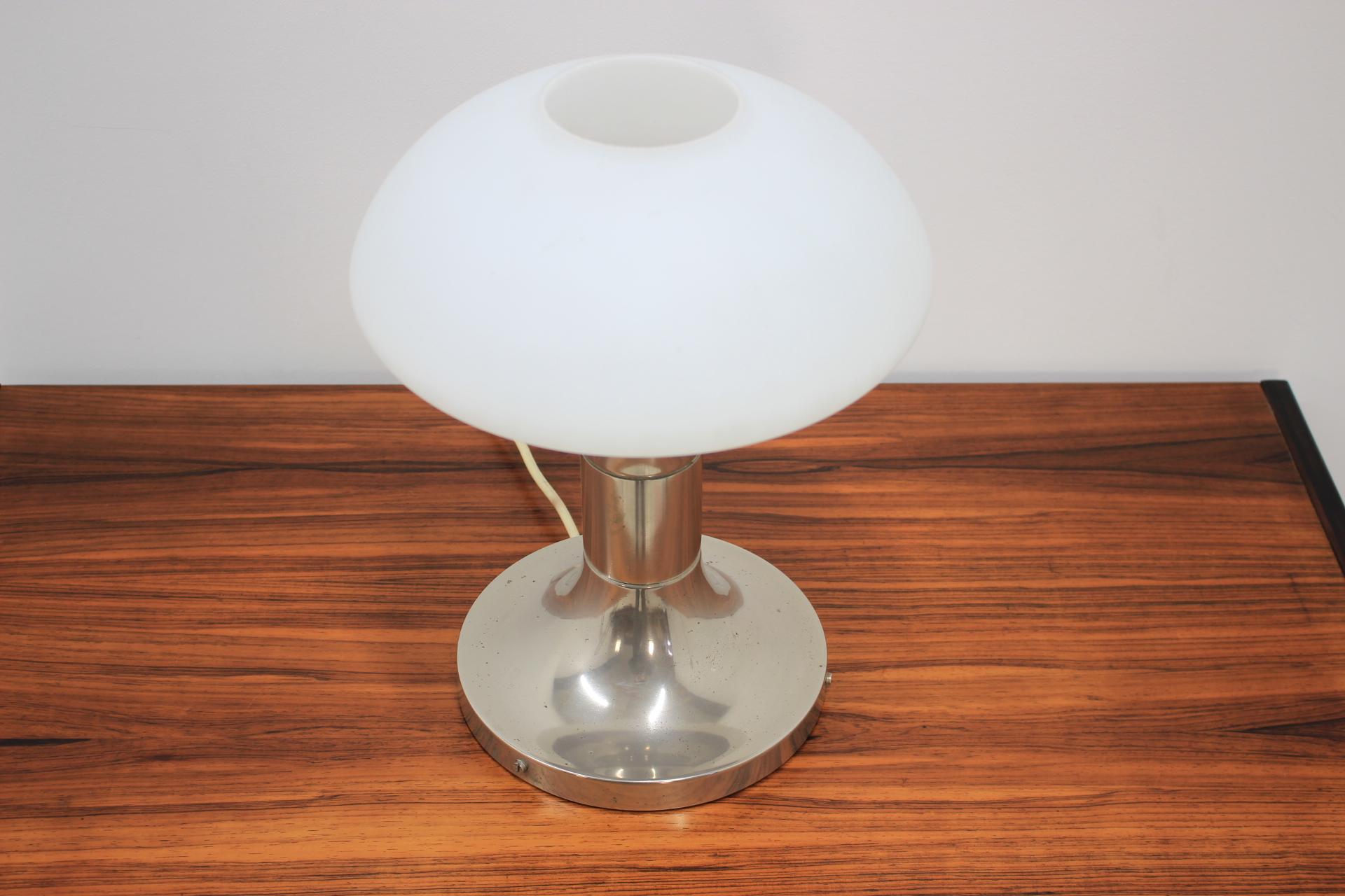 - Made in Germany
- Made of metal, milk glass
- Glass has wear signs of use 
- Original condition.