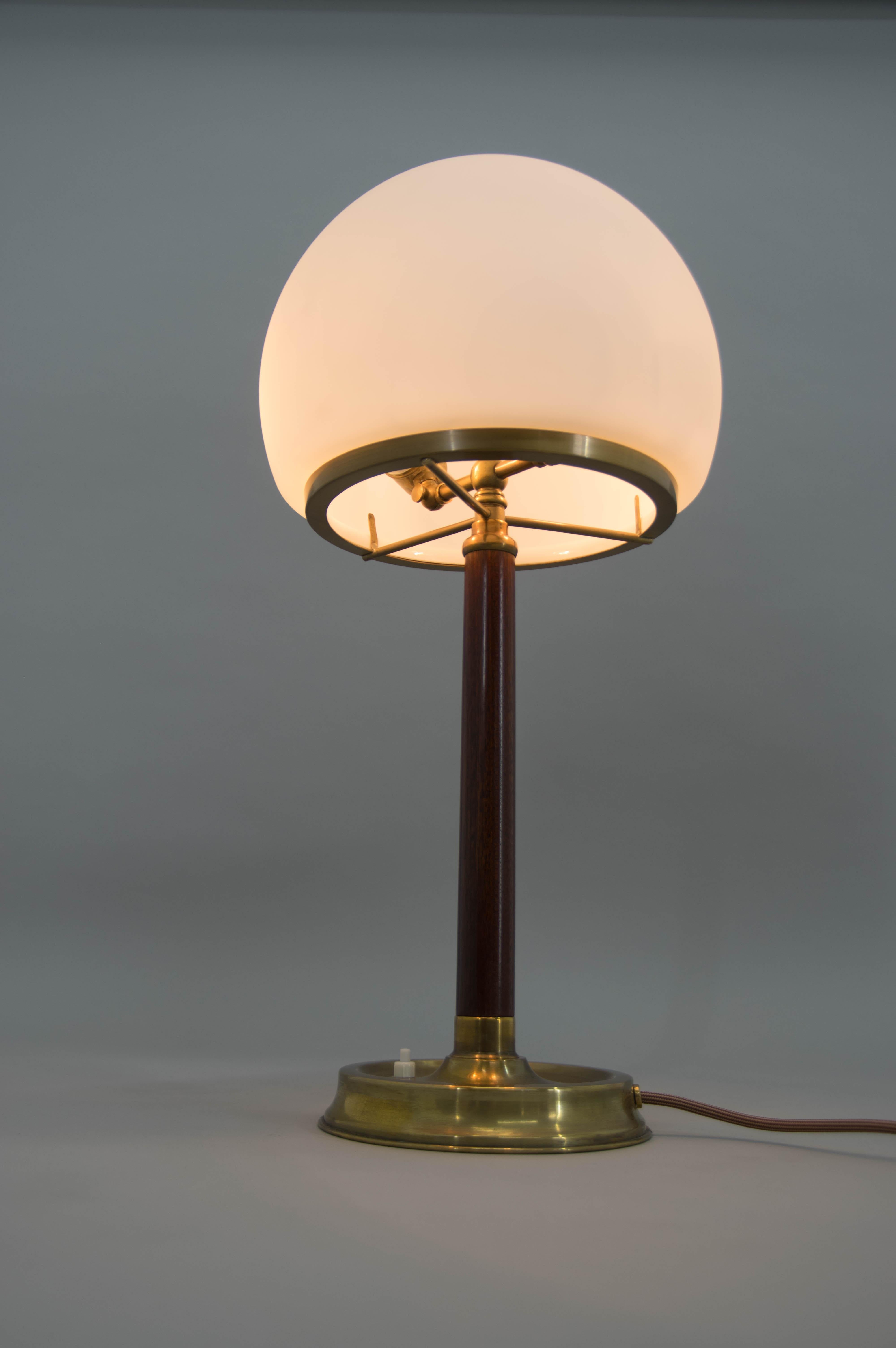This beautiful elegant table lamp is attributed to Adolf Loos and was executed by IAS by Franta Anyz for a luxury villa in Prague.
Item was carefully restored and is in perfect condition.
Each original socket has its own joint so that it can be