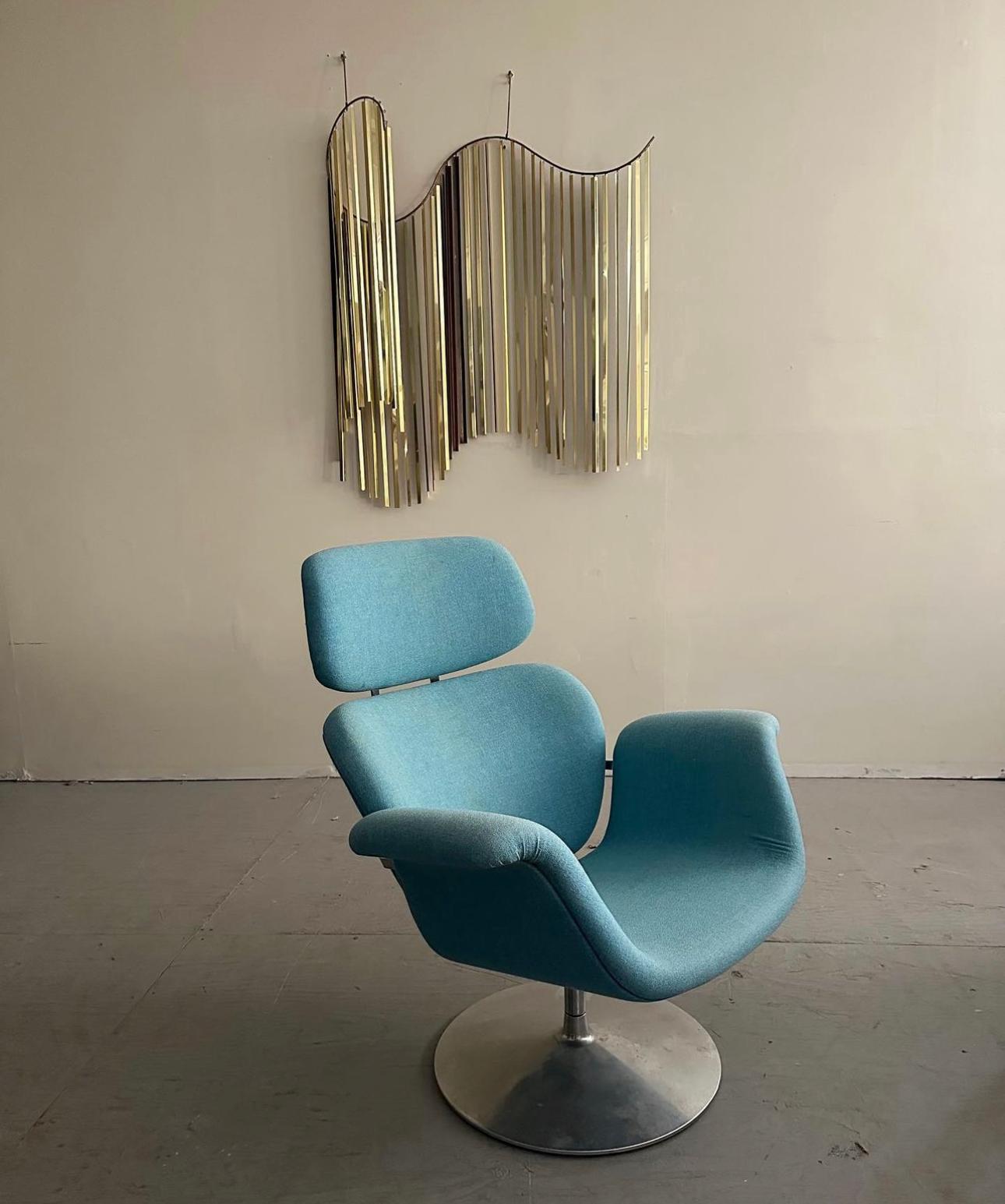 Mid-Century Modern “Big Tulip” Lounge Chair Designed By Pierre Paulin For Artifort. Originally designed by Pierre Paulin in 1965, this vintage “Big Tulip” lounge chair is made of molded and pressed wooden shells, and sits on a chromed steel base.