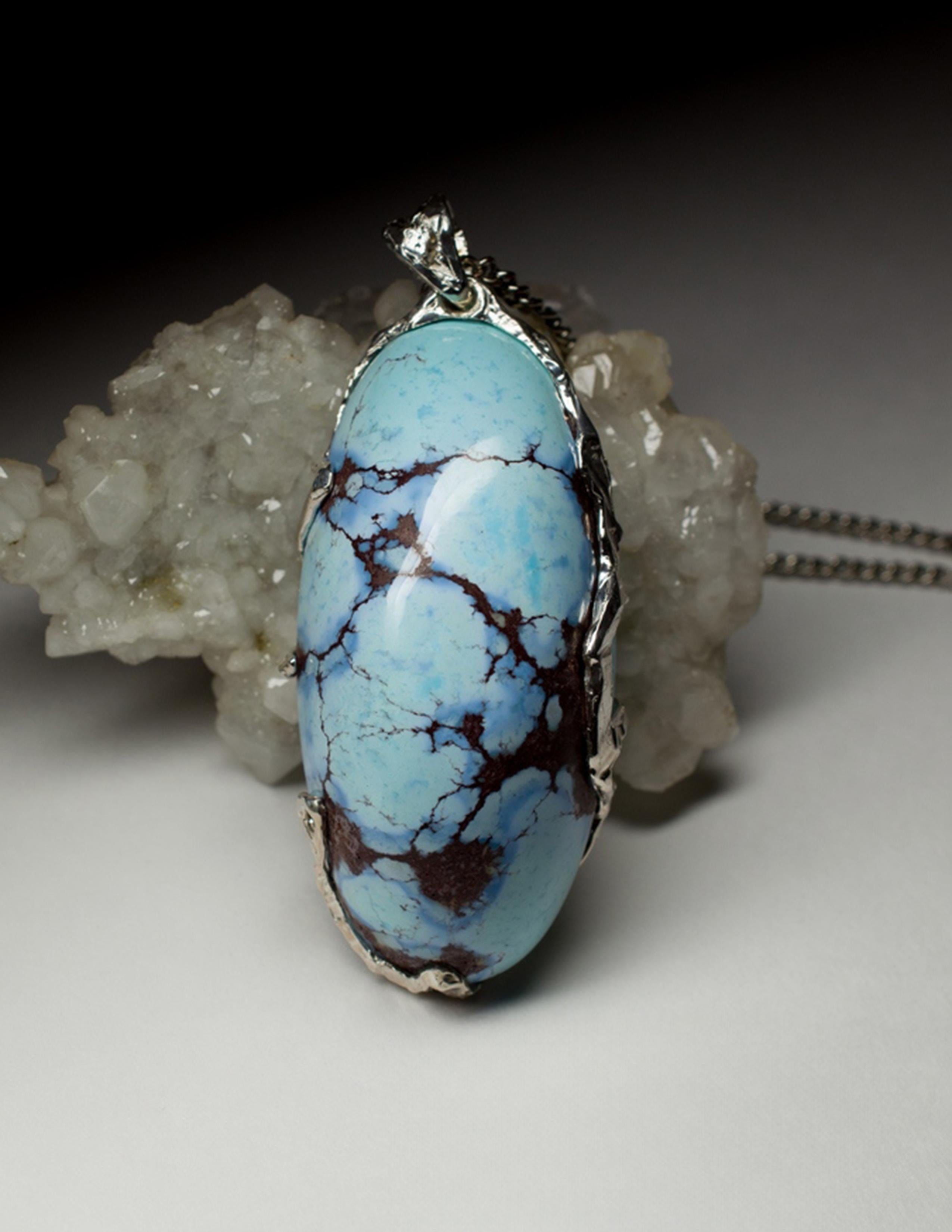Large silver pendant with natural fine quality Turquoise Cabochon
turquoise origin - Kazakhstan
turquoise weight - 105.70 carats
pendant weight - 27.16 grams
pendant height - 2.4 in / 61 mm
stone measurements - 0.59 x 0.94 x 1.97 in / 15 х 24 х 50