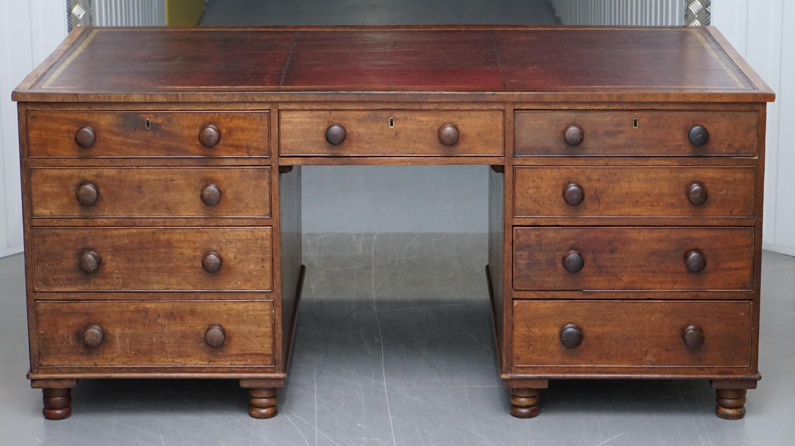 We are delighted to offer for sale this large Victorian twin pedestal 18 drawer double sided mahogany partner desk with oxblood leather top

This desk is a good large size, originally designed as you can see for two people to share, it's rare to