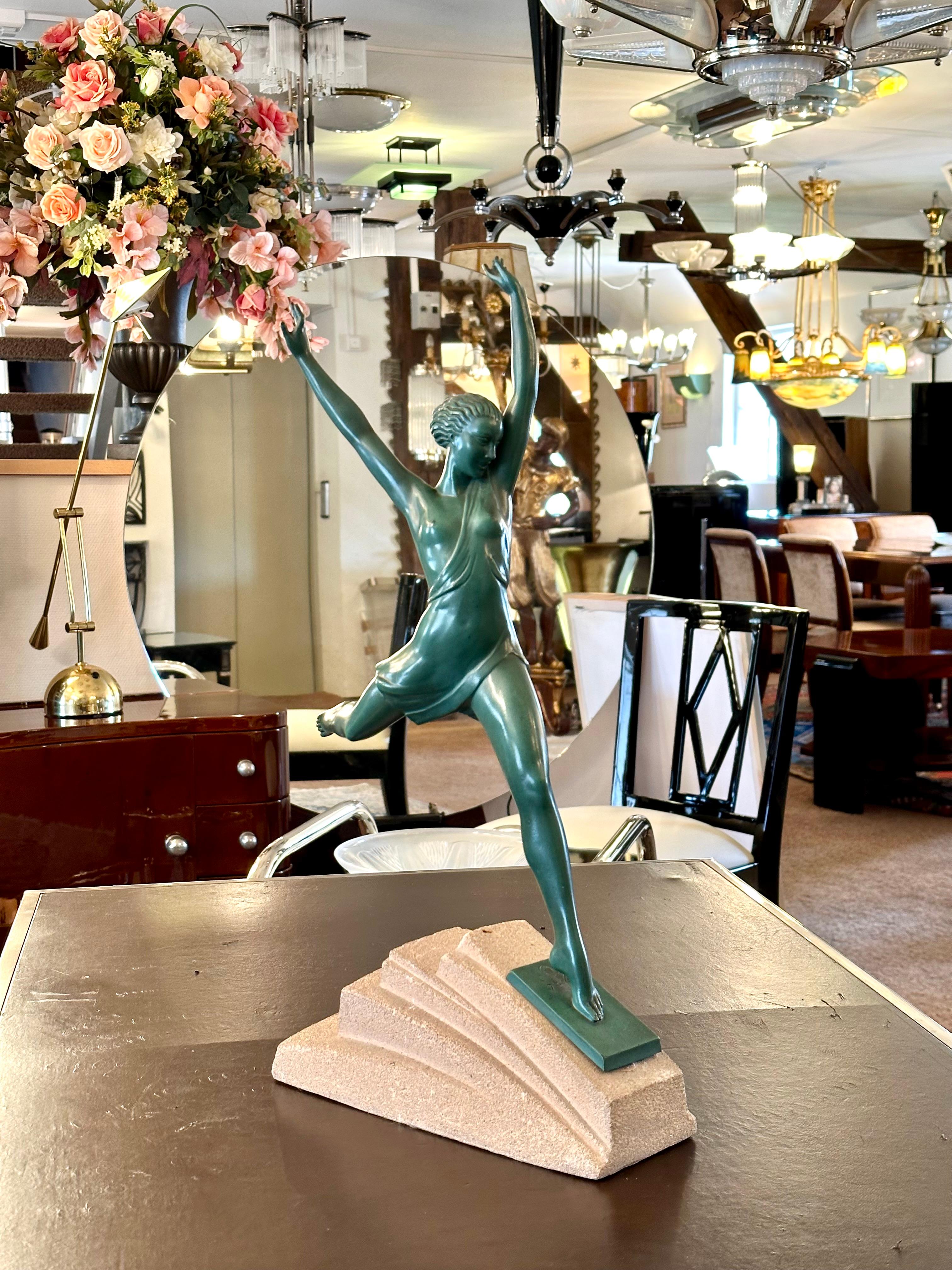 OLYMPIA 
Big, dynamic sculpure of an Greek athlete. 
Colored patinated white bronze with original patina. 
Sloping stone base with signature. 

Original work of Pierre Le Faguay, signed with his pseudonyme FAYRAL for the Max Le Verrier Foundry,