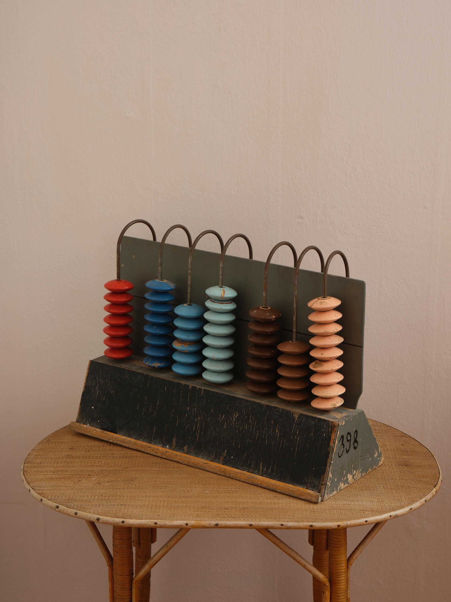 A big and eye catching decorative piece for every room, this vintage handmade abacus is beautifully patinated and made in colors that will keep you looking. Easy on the eyes, hard to find, impossible not to love. Amazing colors and great