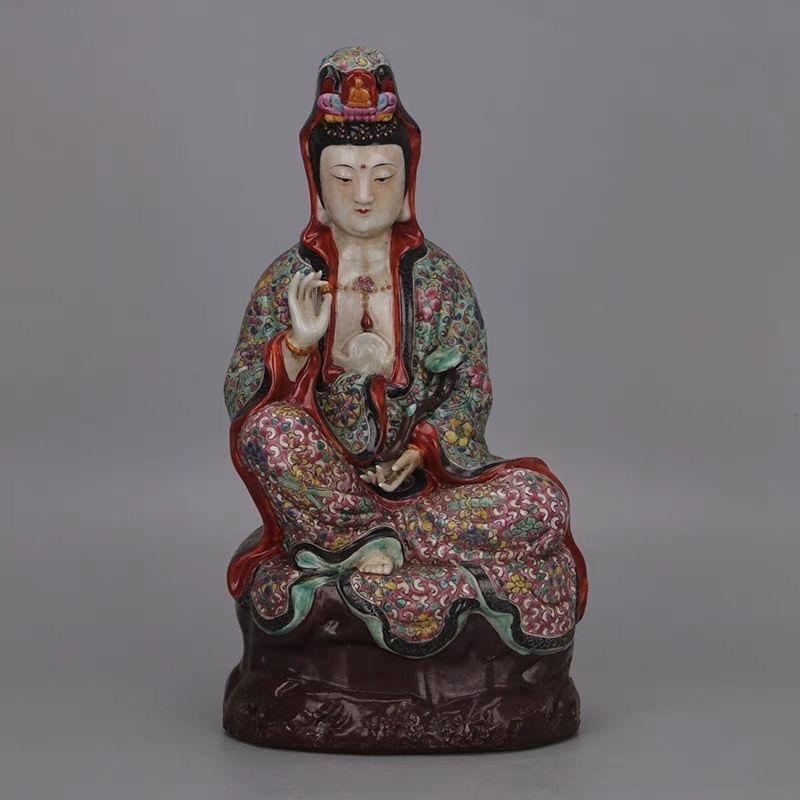 This Antique Ceramic Famille Rose Buddha Statue is a stunning masterpiece that embodies the elegance and craftsmanship of traditional Chinese artistry. Handcrafted in the famous Jingdezhen porcelain kilns, this exquisite piece features the mark of