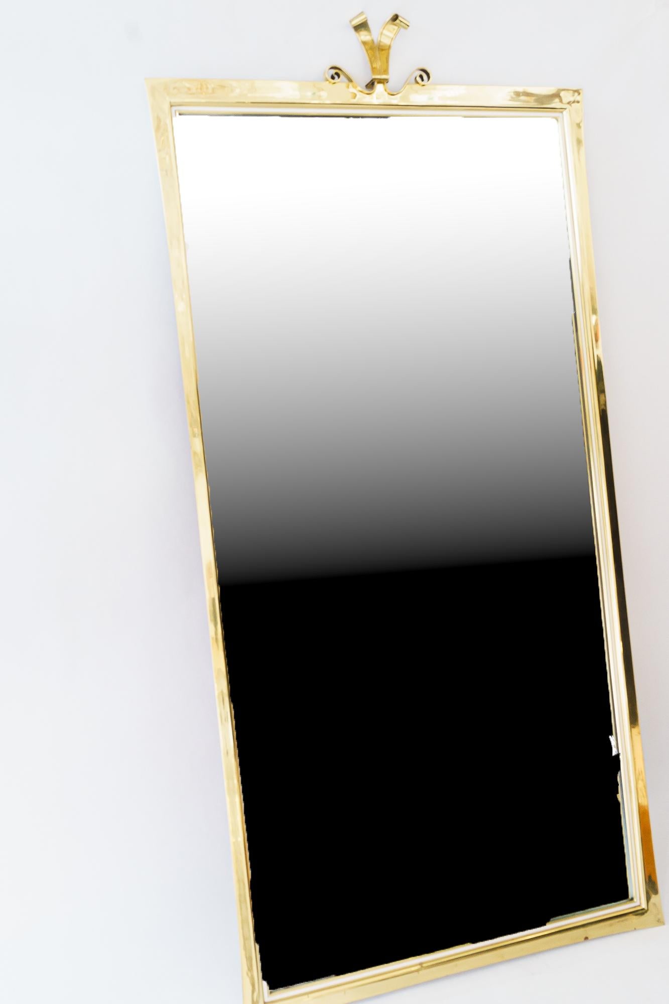 Big Wall mirror by Vereinigte Werkstätten München, Germany 1950s
Original condition
Visible signs of use on the brass.
Original mirror
