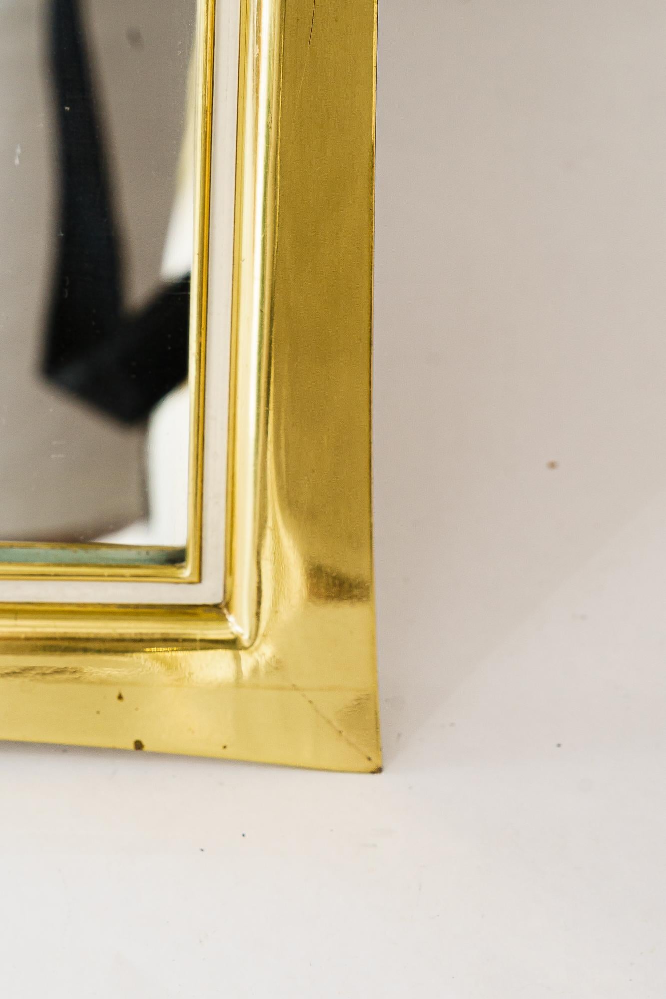 Brass Big Wall mirror by Vereinigte Werkstätten München, Germany 1950s For Sale
