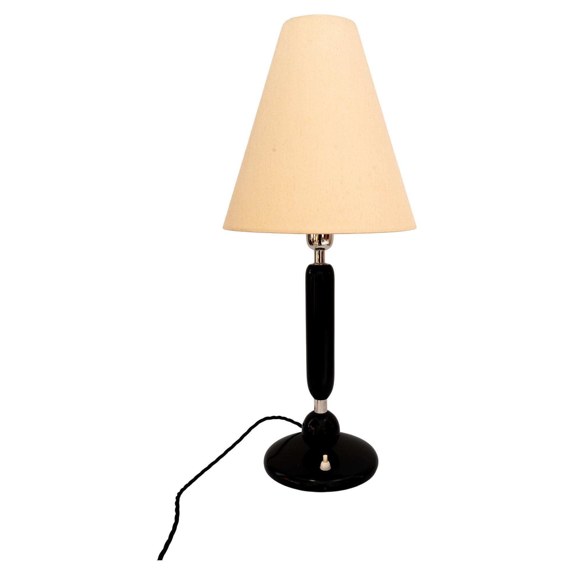 Big wood and nickel table lamp with fabric shade around 1920s For Sale
