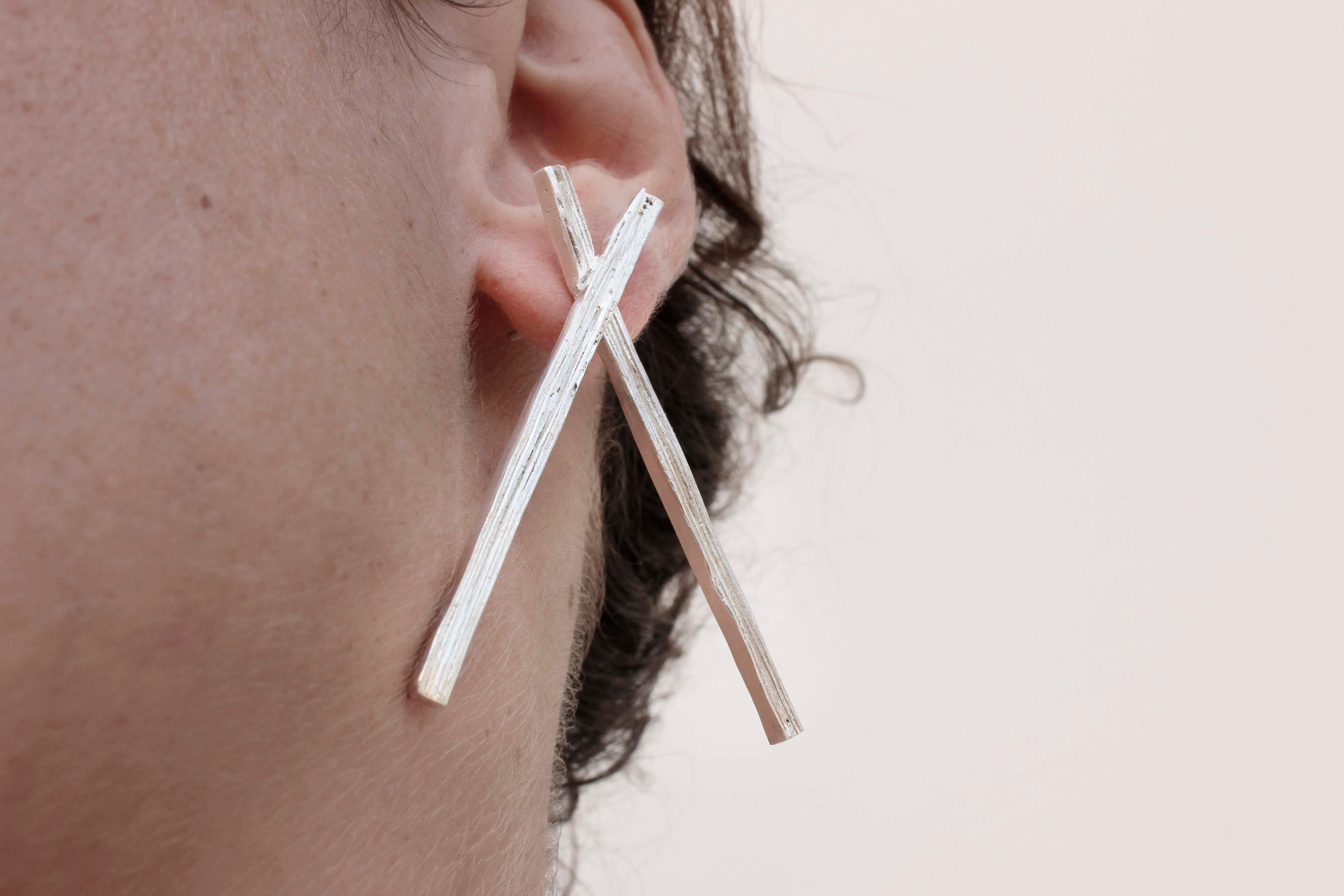 Made from eco silver sheets soldered together, in order to create this unique texture of layers.

The earrings are part of project_x. A collection inspired by the electronic music era.

Length: 5.5 Centimetres

Width: 4 Centimetres