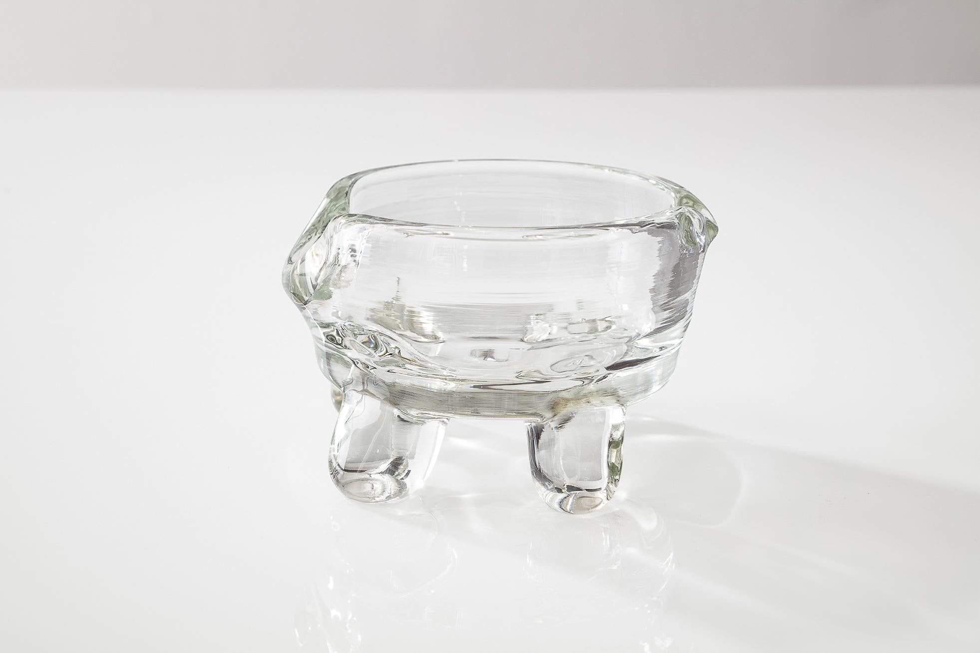 Weighty in presence, with translucence to put your smaller objects on display, this claw-foot sculpture can effortlessly accent other pieces or stand alone.

Handmade by Jason Bauer and Romina Gonzales
Materials: Glass
Dimensions: H 3