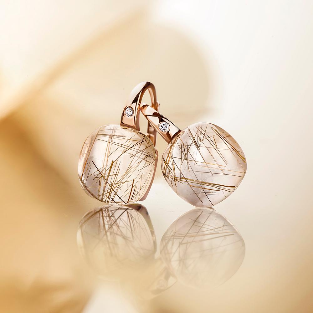 Mini Sweety earrings in 18kt pink gold with Rutile Quartz and a signature diamond (0,02 ct)

We are proud of our flagship collection: Mini Sweety. 
Delightful jewellery in over 50 mesmerising colors, all obtained with 100 percent natural color