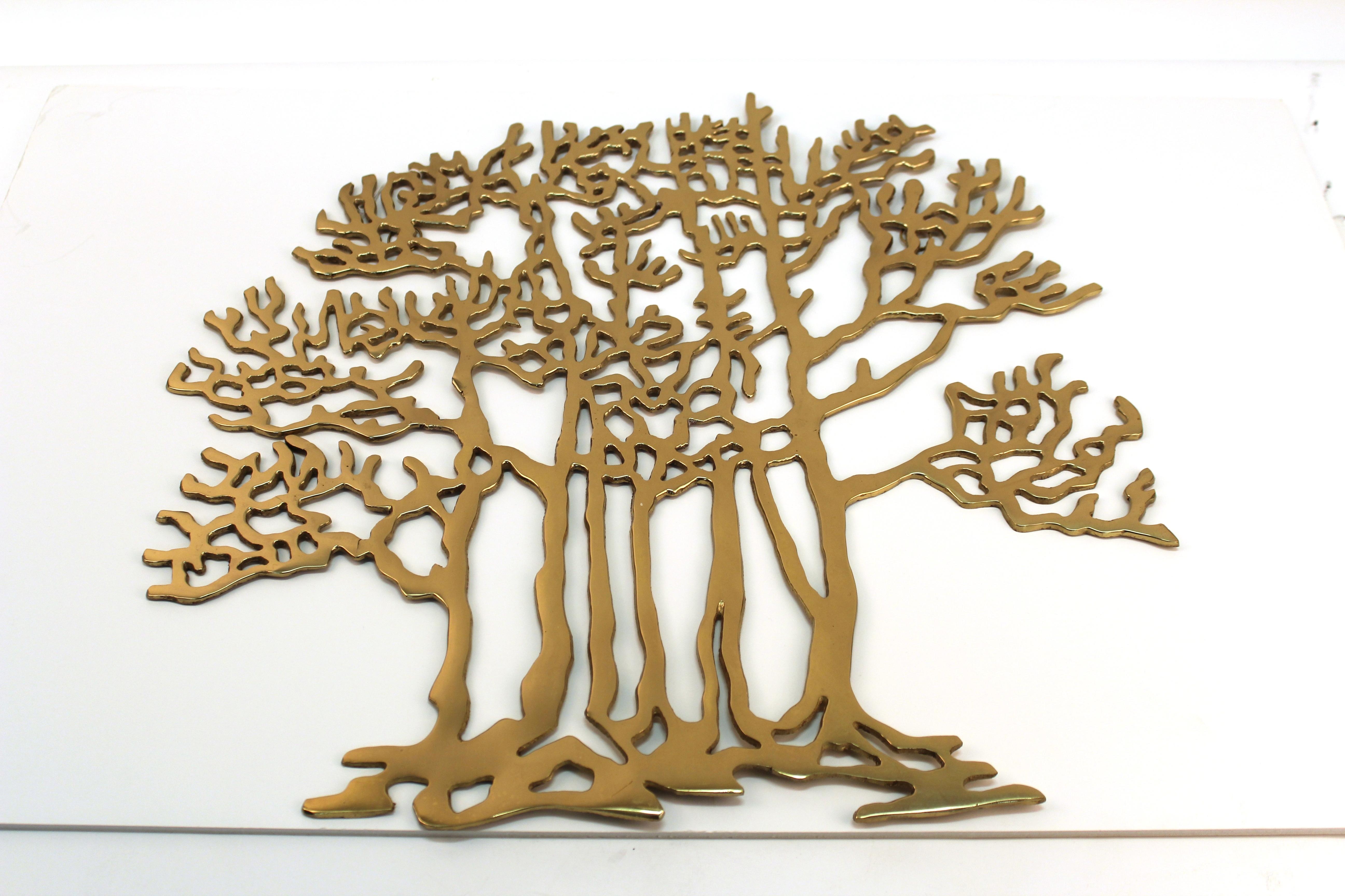 Modern heavy brass wall sculpture in shape of a tree, made by Bijan during the 1980s in the United States. The piece is in good vintage condition and has age-appropriate patina.