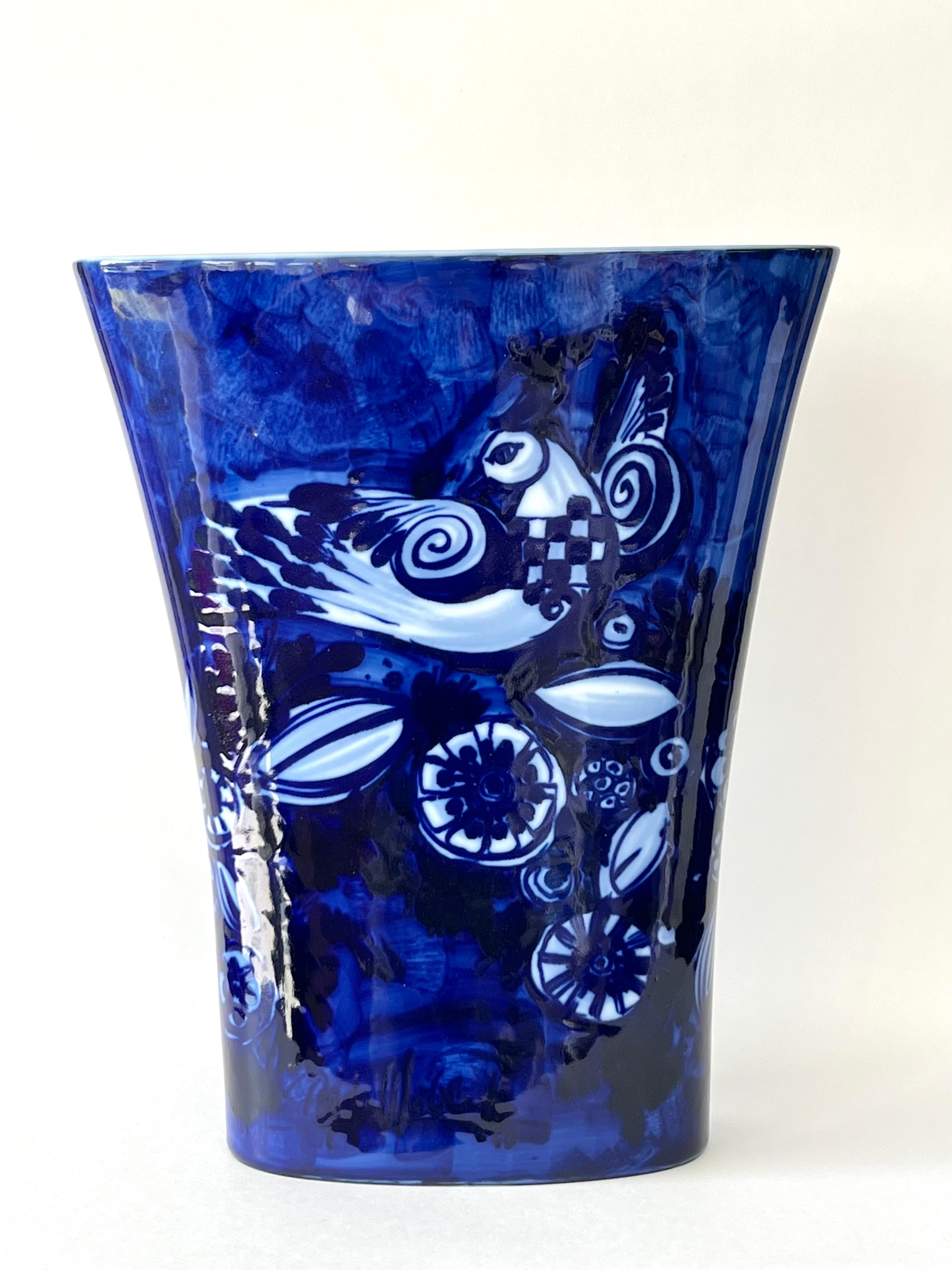 A very large Winblad vase by Rosenthal. Done in blue. Quite beautiful. Signed on bottom.