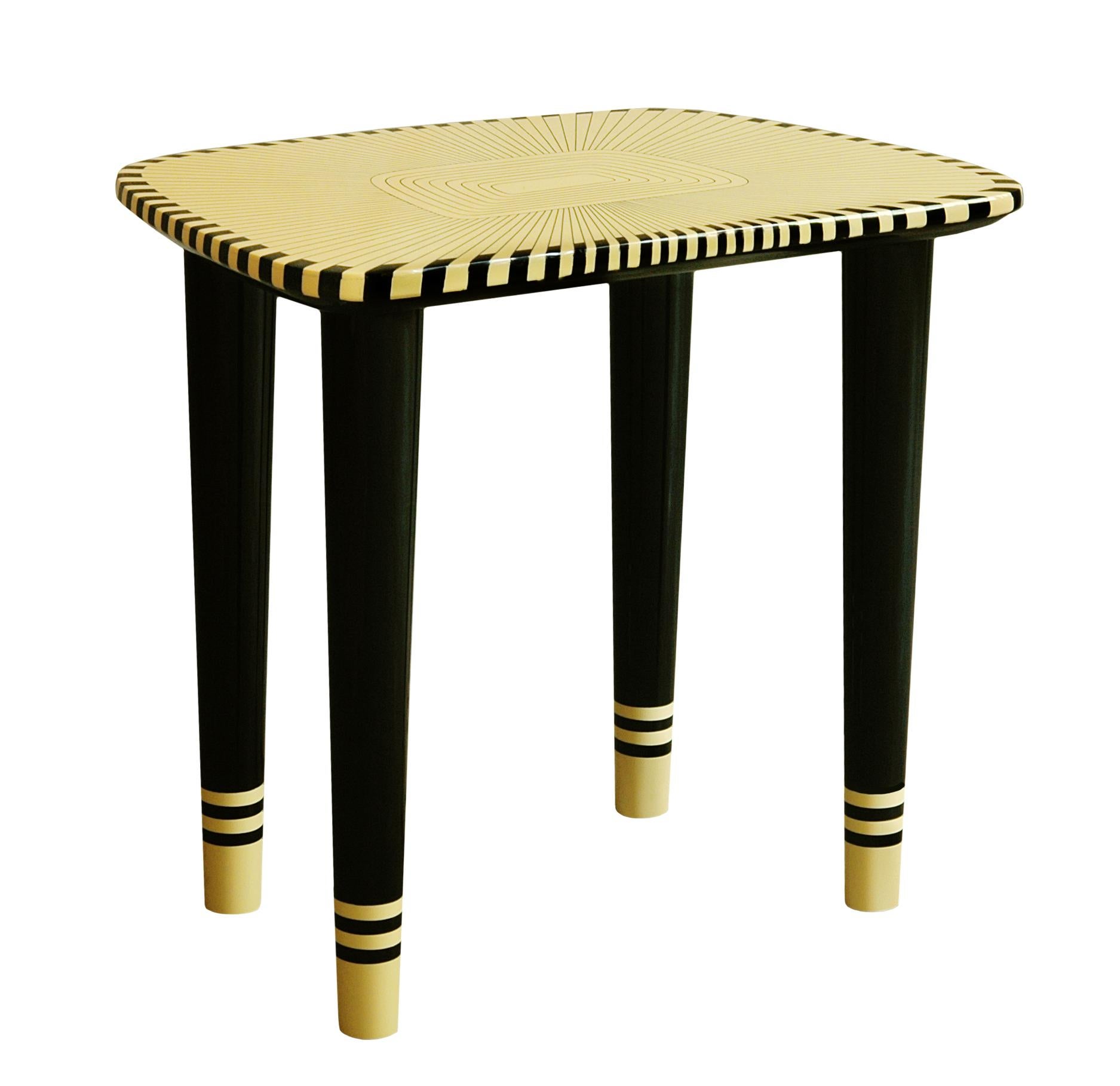 Bijou Marquetry Stool Black and White by Matteo Cibic is an endearing seat which looks especially delightful matched with the woman in Paris dressing table. It is available in a range of colors, which can be customised according to the