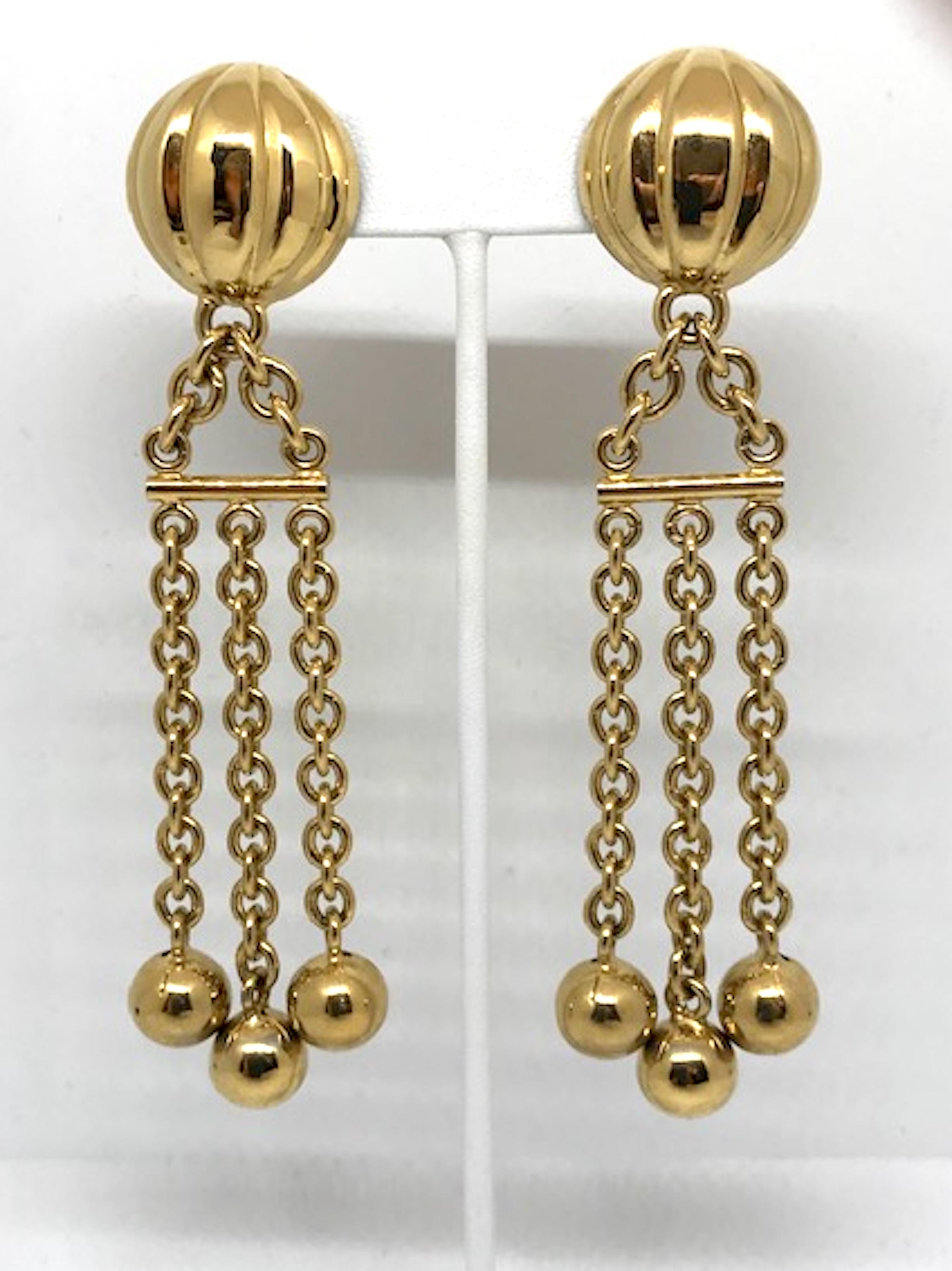 A lovely pair of 1980s gold plate chain with bead fringe earrings from Italian fashion company Bijoux Cascio. Bijoux Cascio jewelry company began in 1948 by Gaetano Cascio in Firenze Italy. This prestigious costume jewelry house created lines of