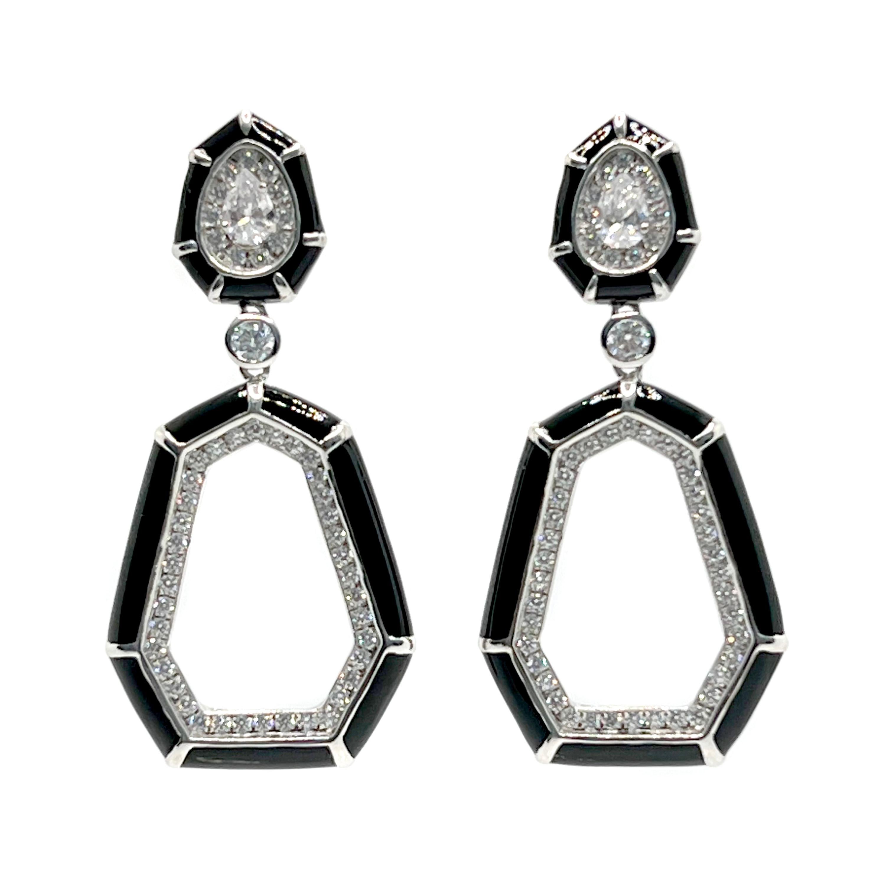 Stunning Black Enamel Septagon Door Knocker earrings. Handset with round and pear shape simulated diamonds on platinum rhodium plated over sterling silver and finished with shiny white enamel. The earrings are 2-1/2