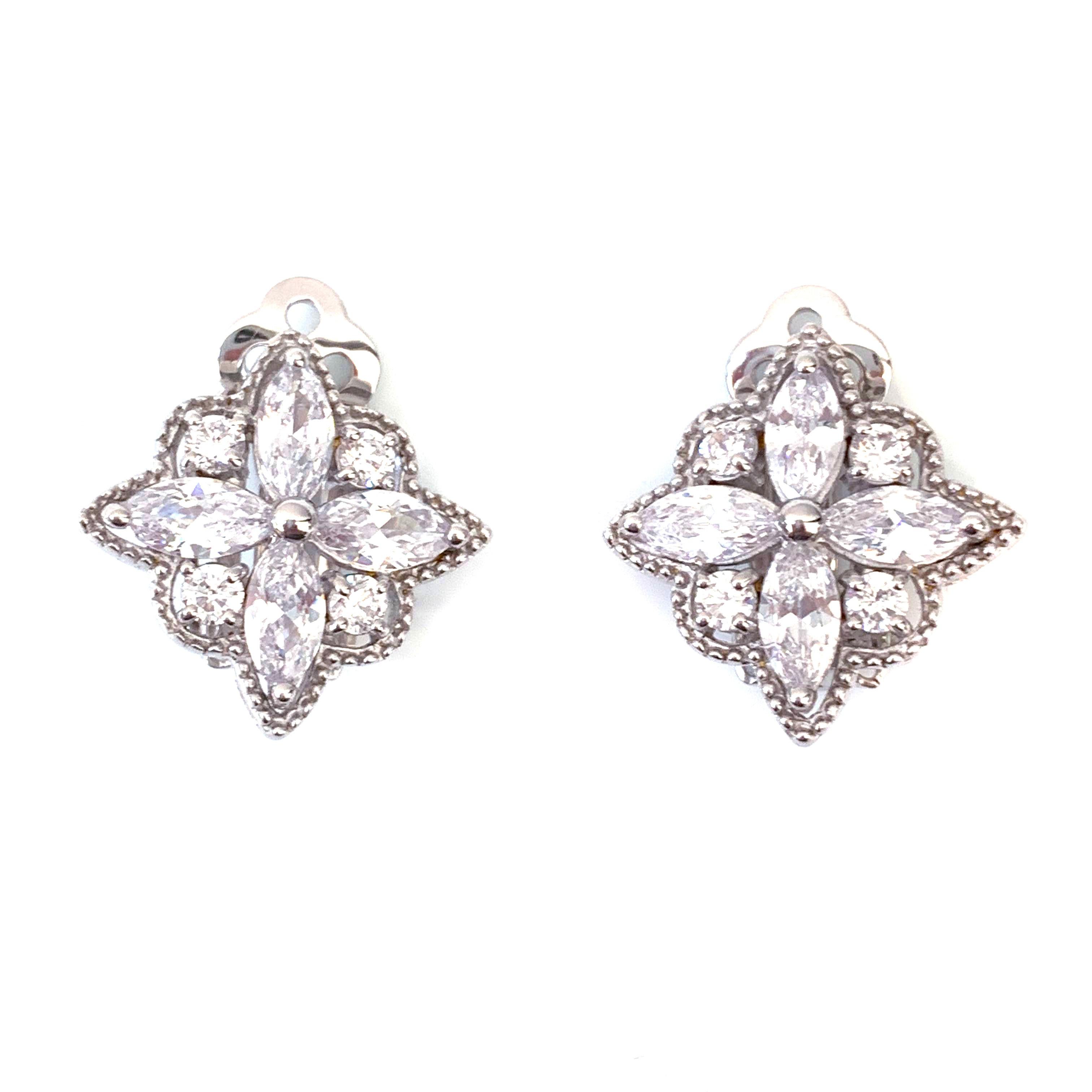 Byzantine Flower Faux Diamond CZ Clip-on Earrings

These earrings feature top quality marquis and round faux diamond cubic zirconia, handset in platinum rhodium plated sterling silver, and adorned with beaded trim. The earrings measure approximately